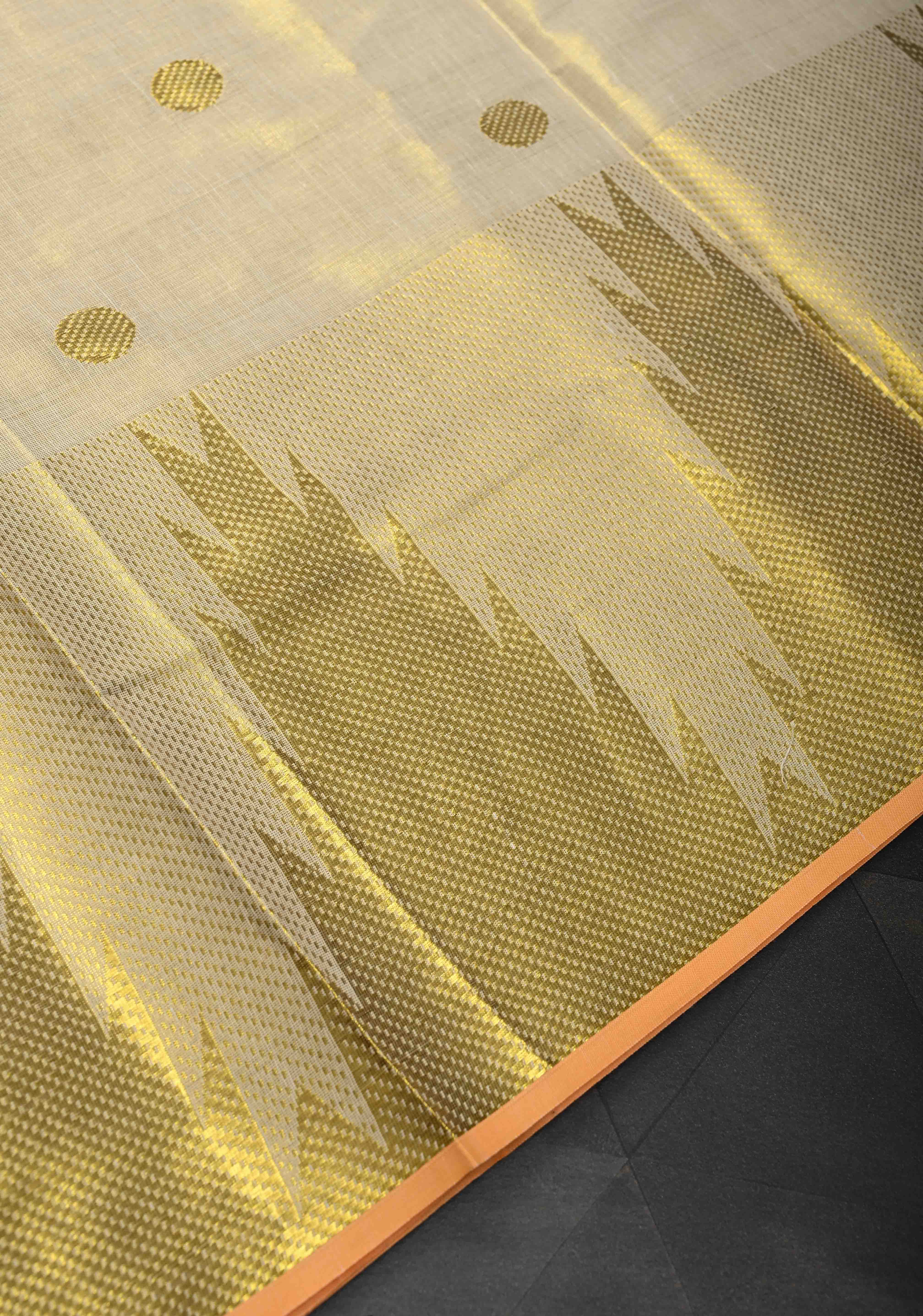 Beige Tissue Cotton Saree with Zari Coin Buttis And Temple Border | Shobitam