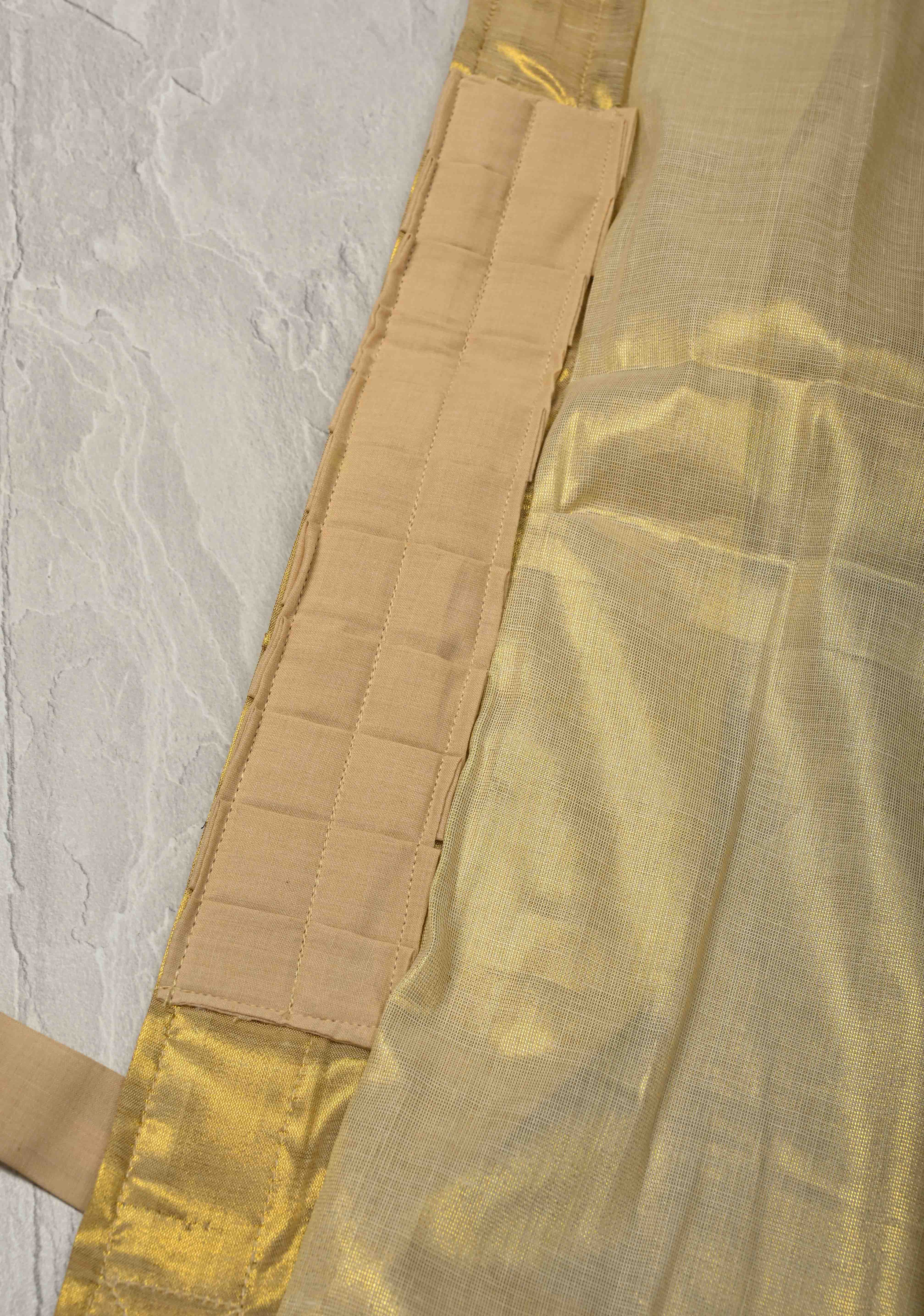 Off White Pre Stitch Adjustable Kerala Kasavu Cotton Tissue Saree with Zari Borders and pocket | Shobitam