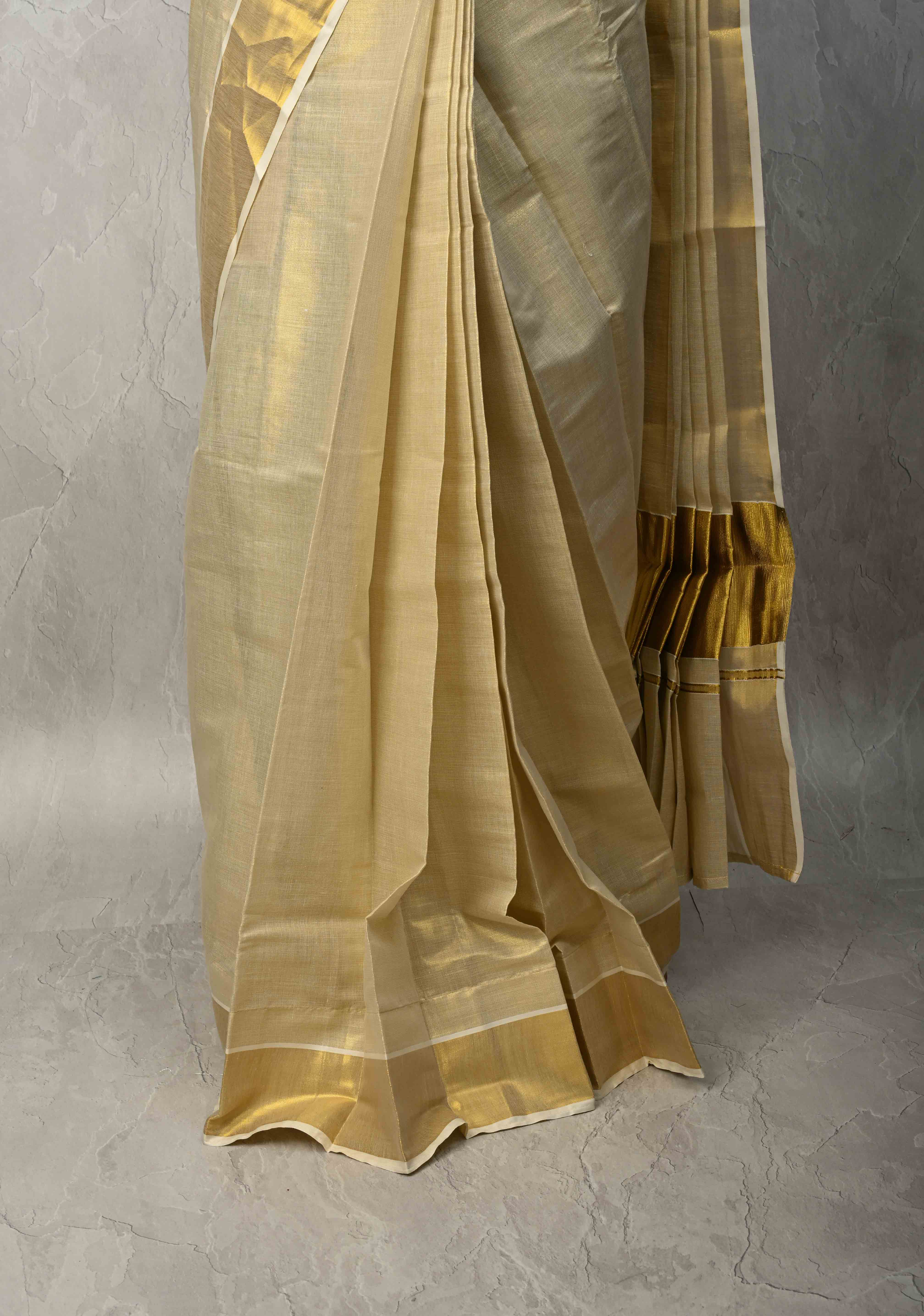 Off White Pre Stitch Adjustable Kerala Kasavu Cotton Tissue Saree with Zari Borders and pocket | Shobitam