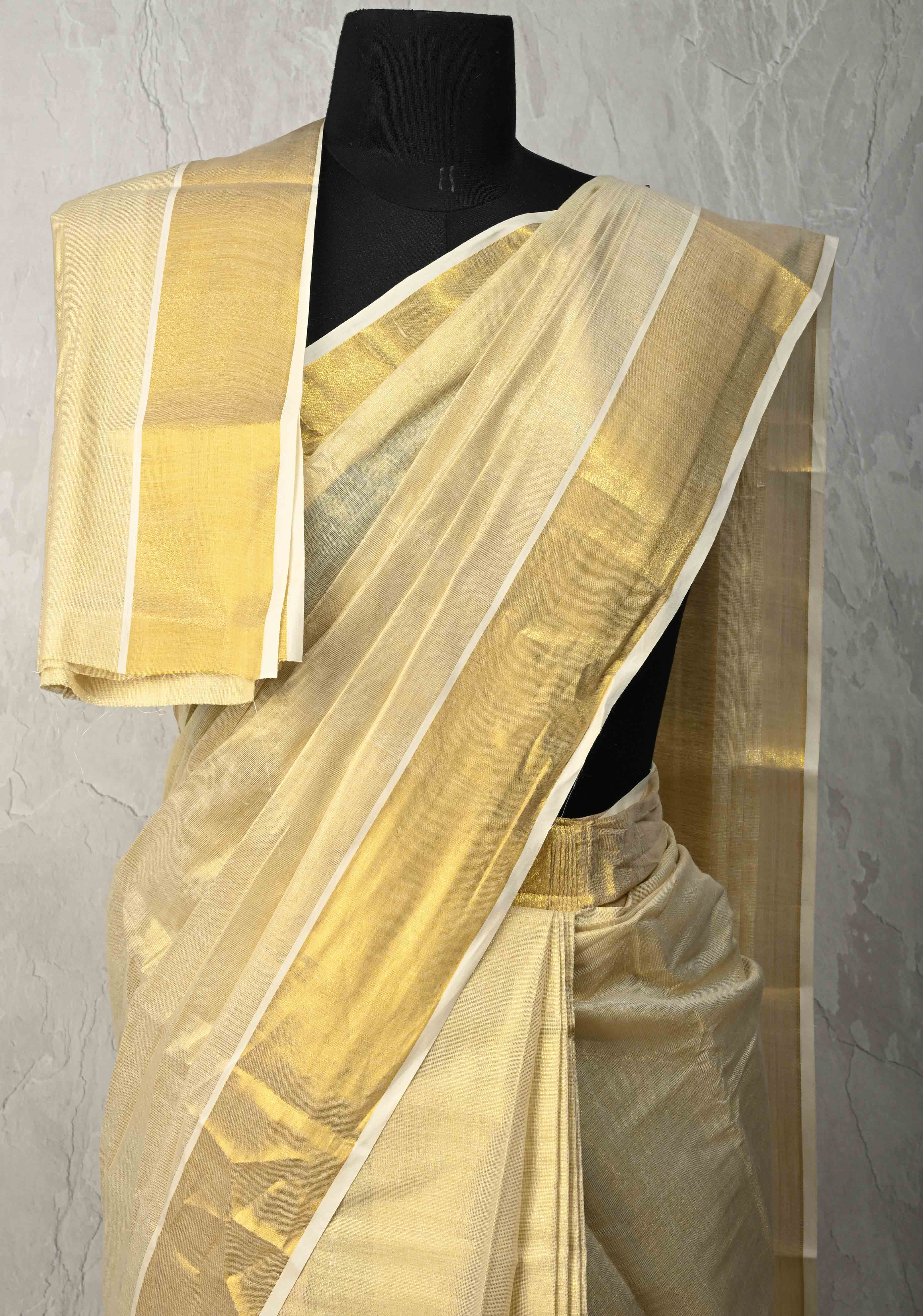 Off White Pre Stitch Adjustable Kerala Kasavu Cotton Tissue Saree with Zari Borders and pocket | Shobitam