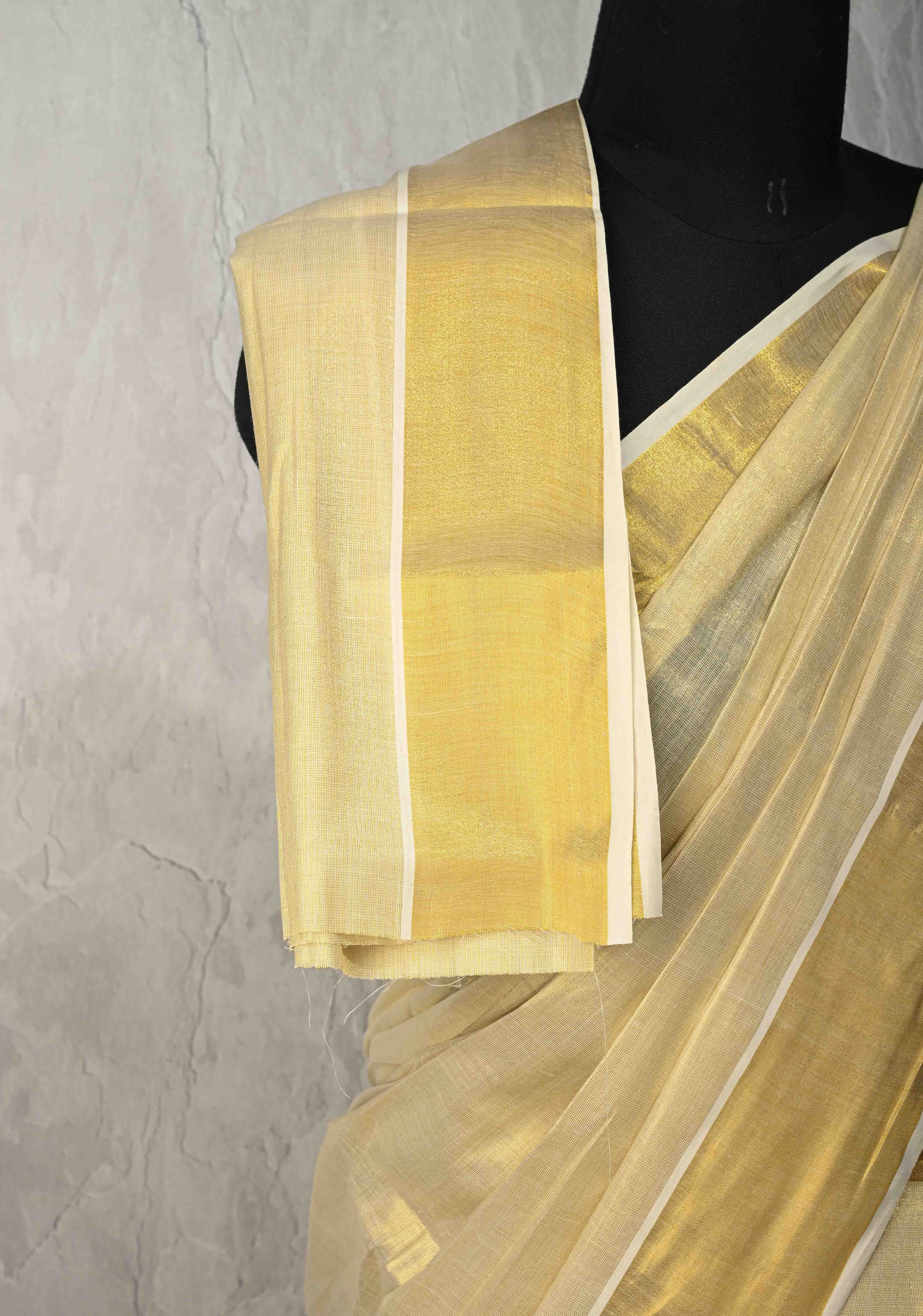 Off White Pre Stitch Adjustable Kerala Kasavu Cotton Tissue Saree with Zari Borders and pocket | Shobitam