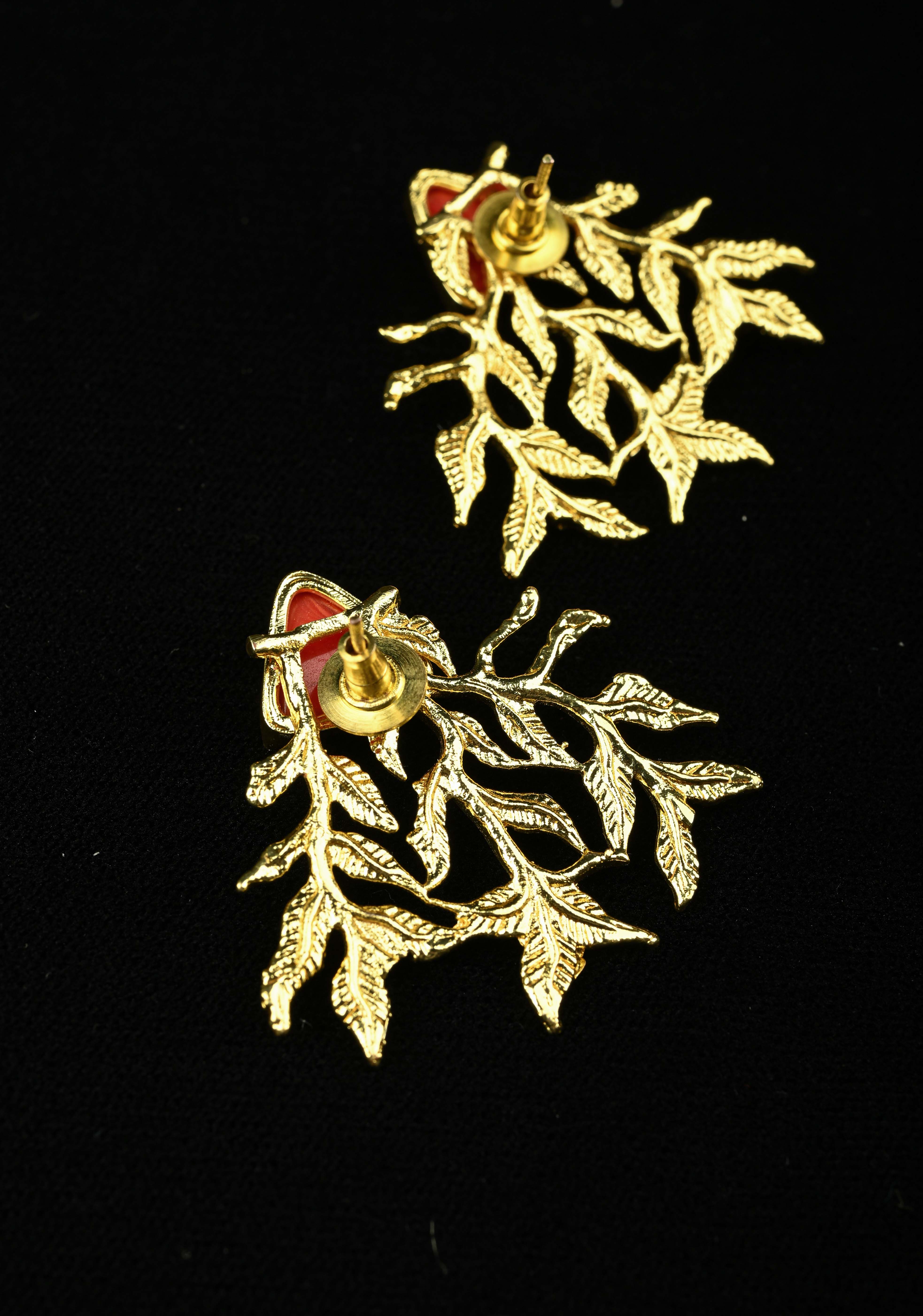Stud Earring With Coral Triangular-Shaped Stone and Gold Leaf Design | Shobitam