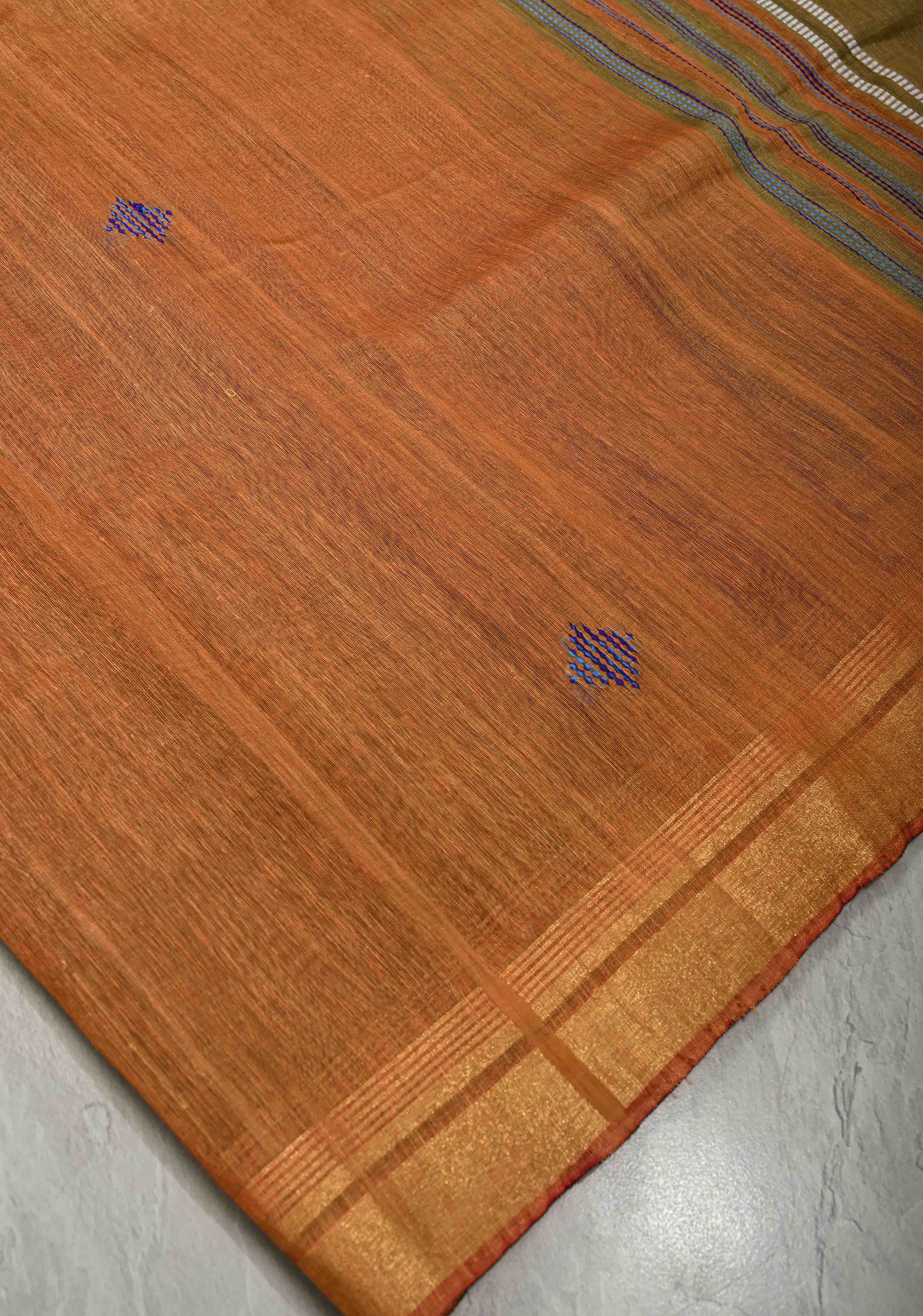 Rust Orange Handwoven Silk Linen Saree with Thread Buttas and Muted Zari Border | Shobitam