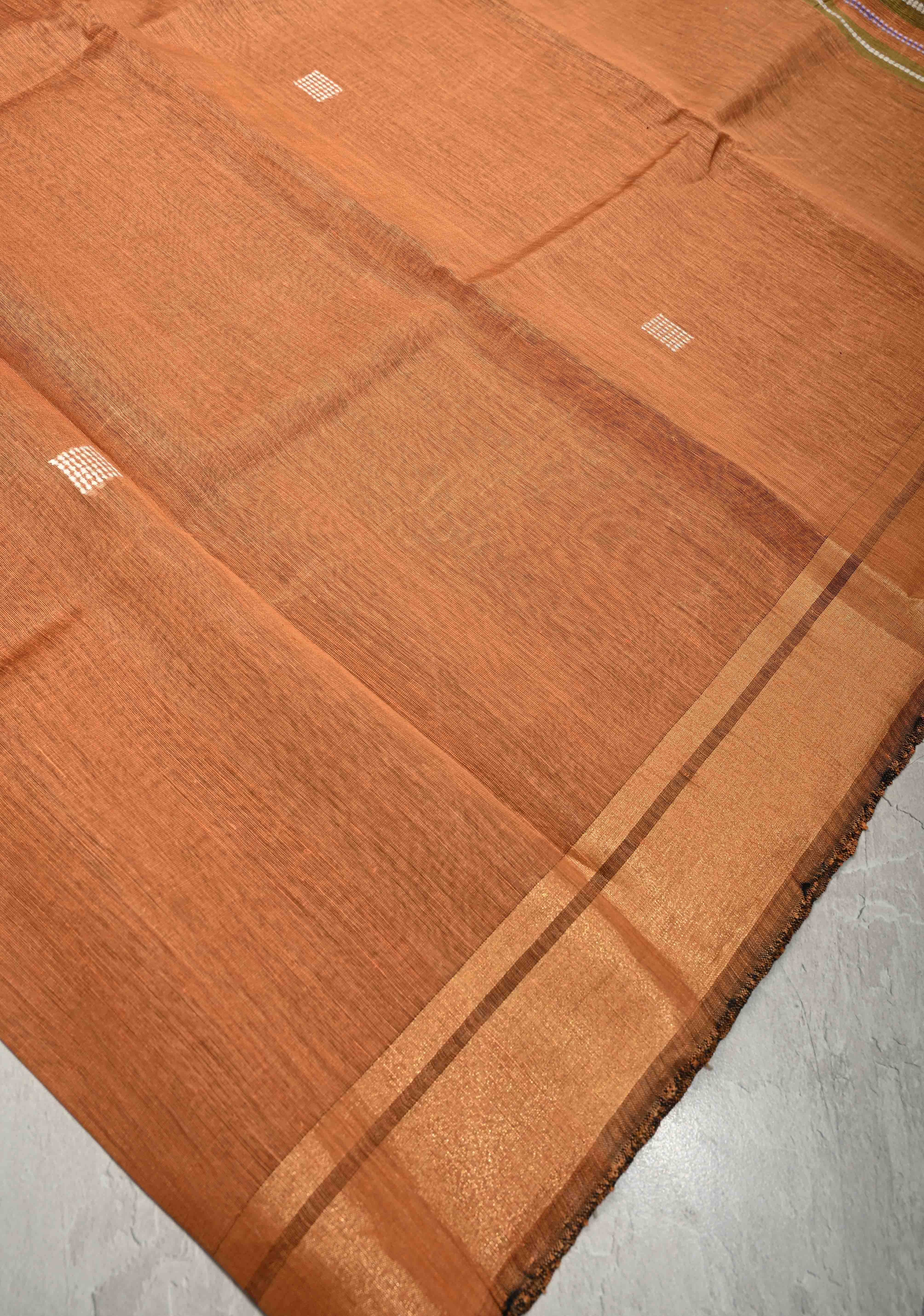 Mustard Orange Handwoven Silk Linen Saree with Thread Buttas and Muted Zari Border | Shobitam