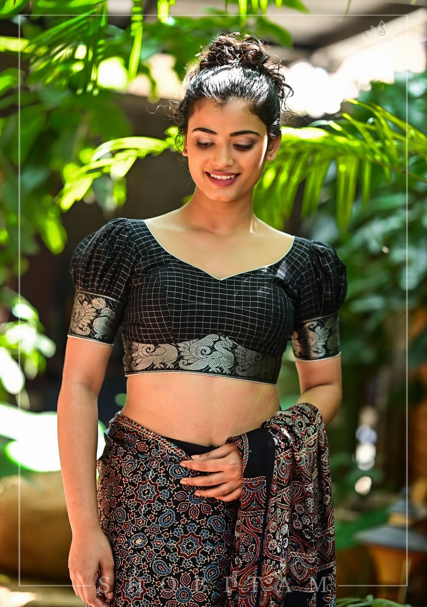 Black Madurai Cotton with SIlver Zari Checks Blouse featuring sweetheart neck and puff sleeves | Shobitam