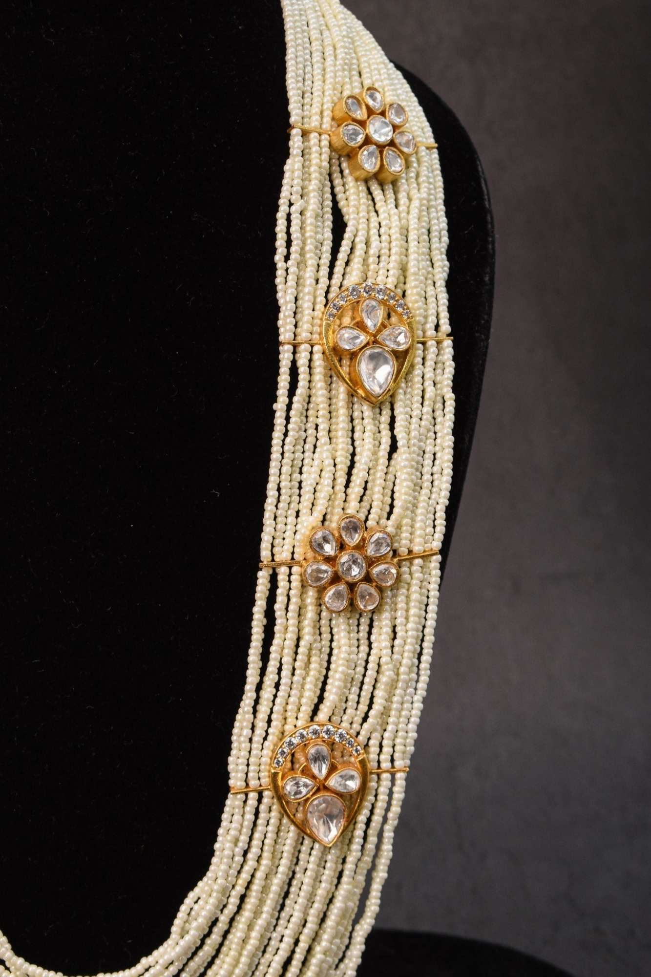 Floral Unit on Multistrand Haar Necklace set in white