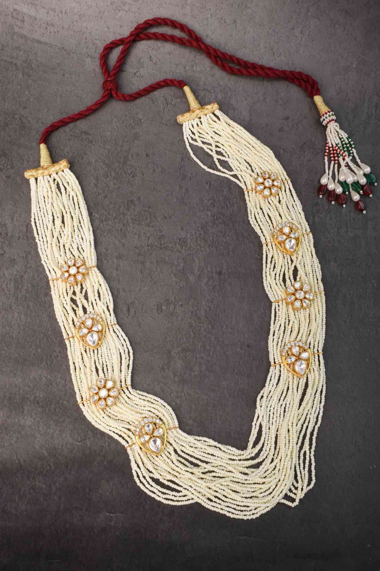 Floral Unit on Multistrand Haar Necklace set in white