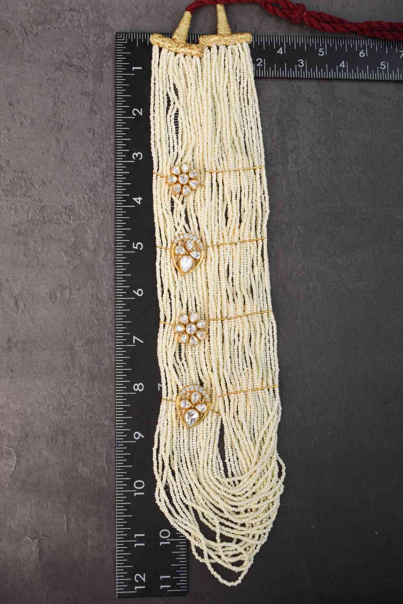 Floral Unit on Multistrand Haar Necklace set in white