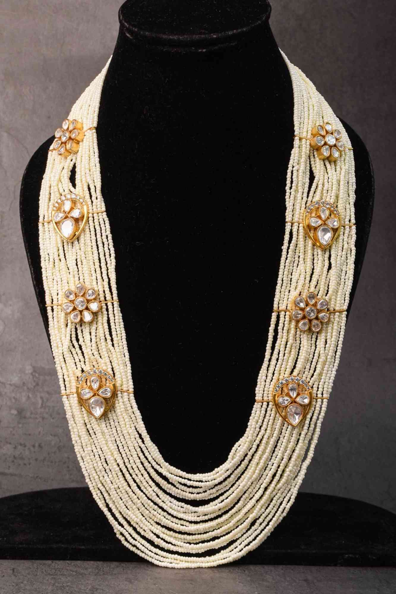 Floral Unit on Multistrand Haar Necklace set in white