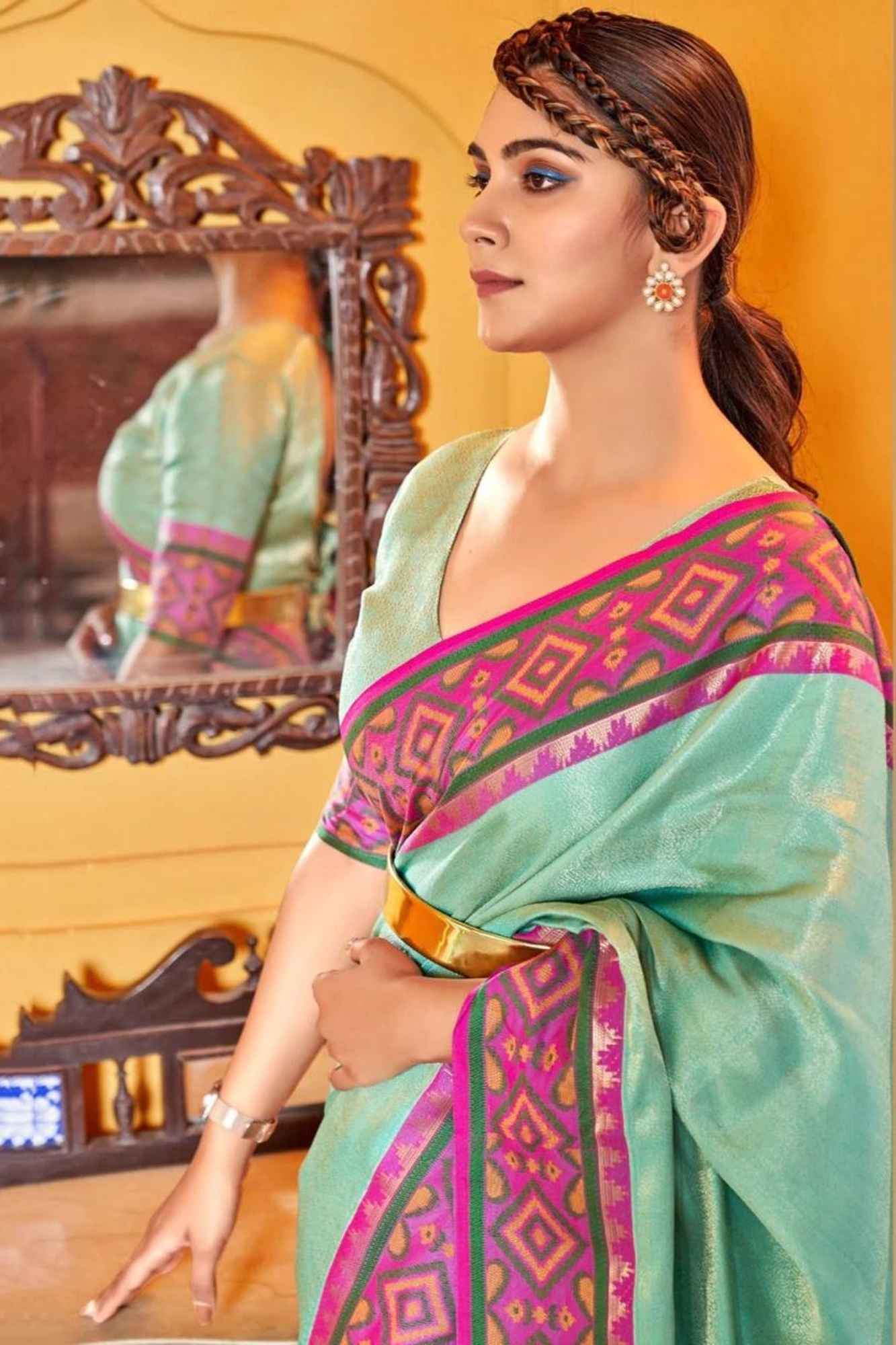 Sea Green Patola inspired Silk with Contrast Pink Ikat-Inspired Border Ready To Wear Saree