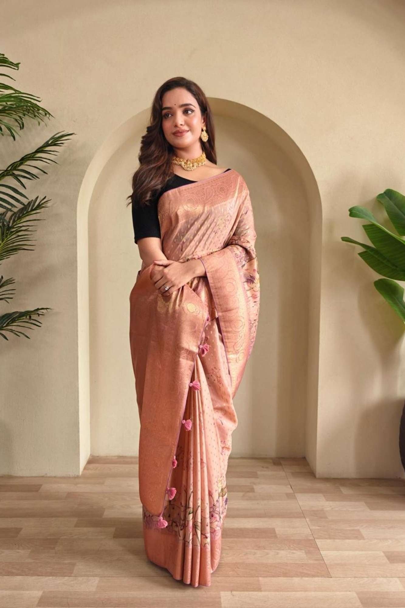 Peach Viscose Georgette Silk with Woven Detailing, Digital Prints & Tassels Ready To Wear Saree