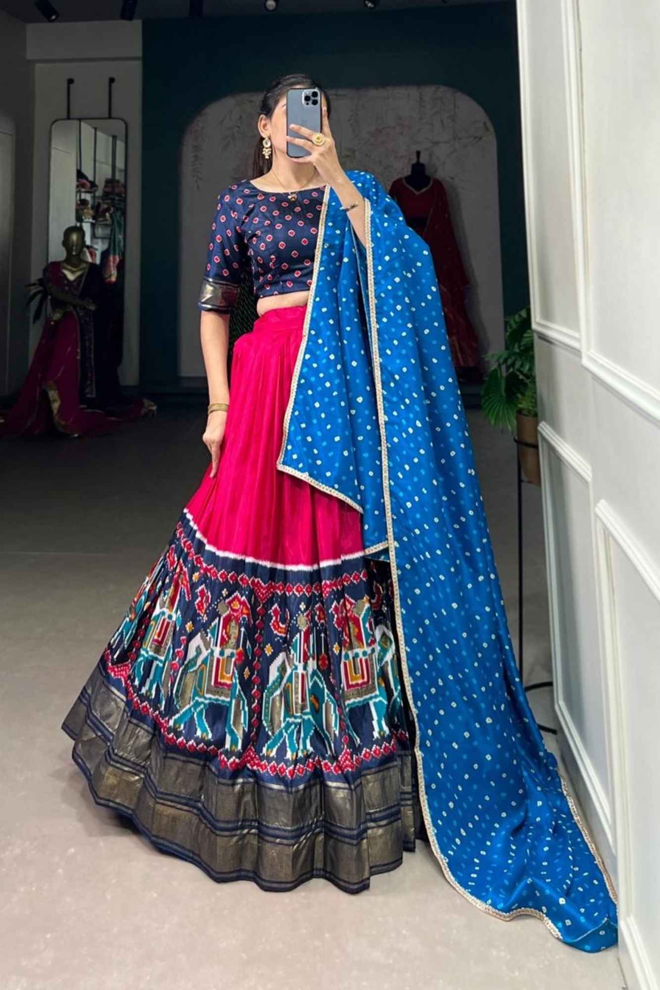 Vibrant Fuchsia Lehenga with Rajasthani Motif Border & Blue Bandhani Dupatta