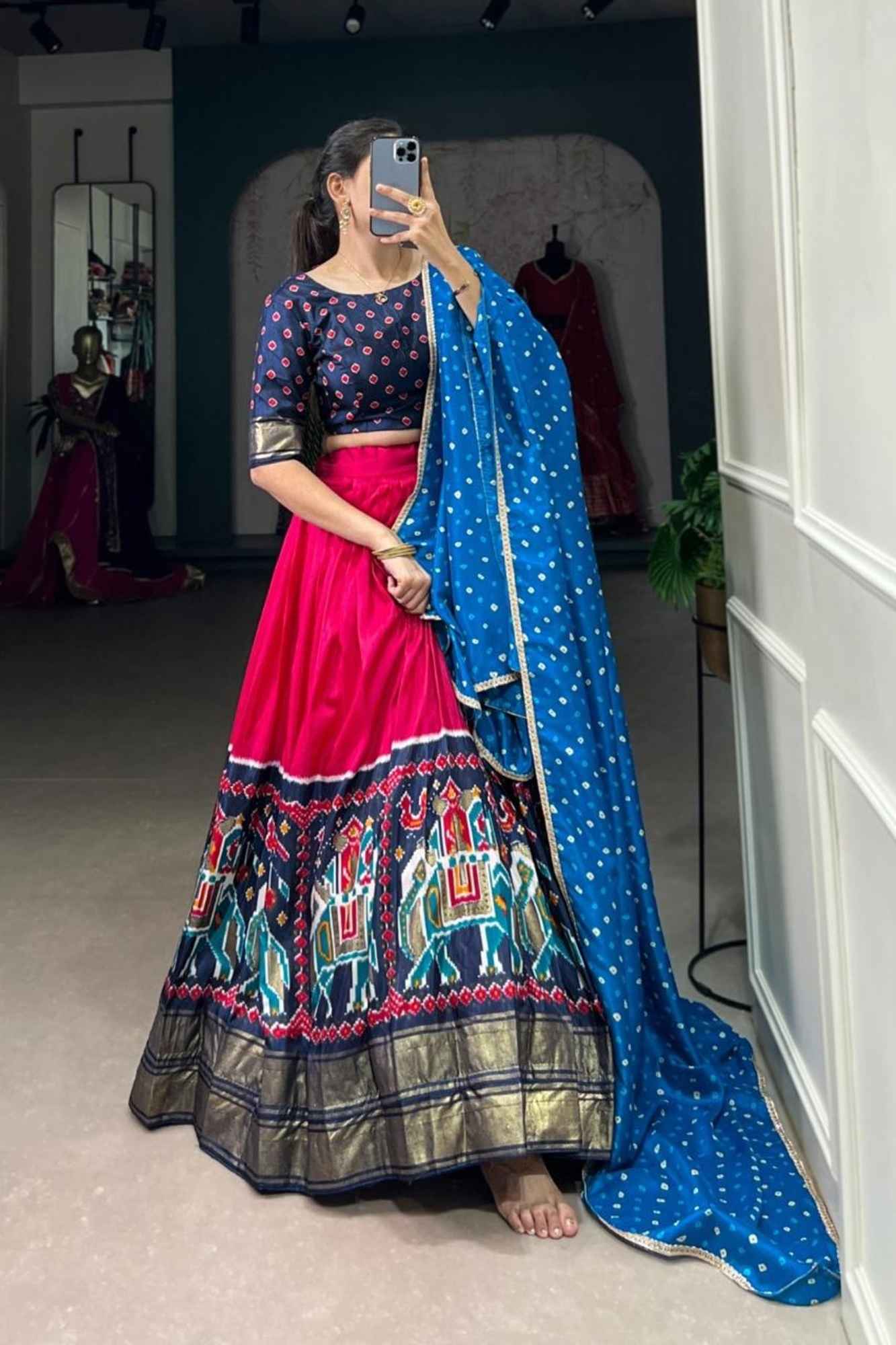 Vibrant Fuchsia Lehenga with Rajasthani Motif Border & Blue Bandhani Dupatta