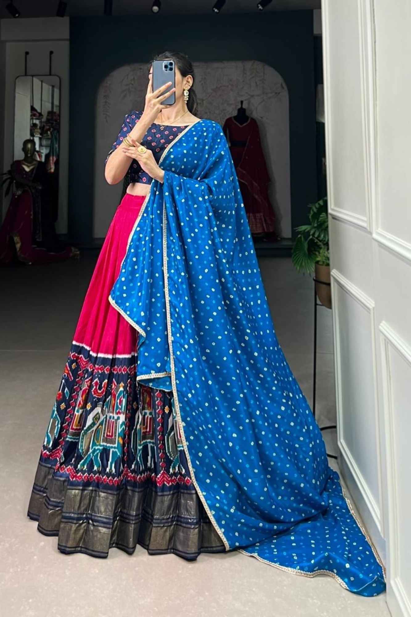 Vibrant Fuchsia Lehenga with Rajasthani Motif Border & Blue Bandhani Dupatta