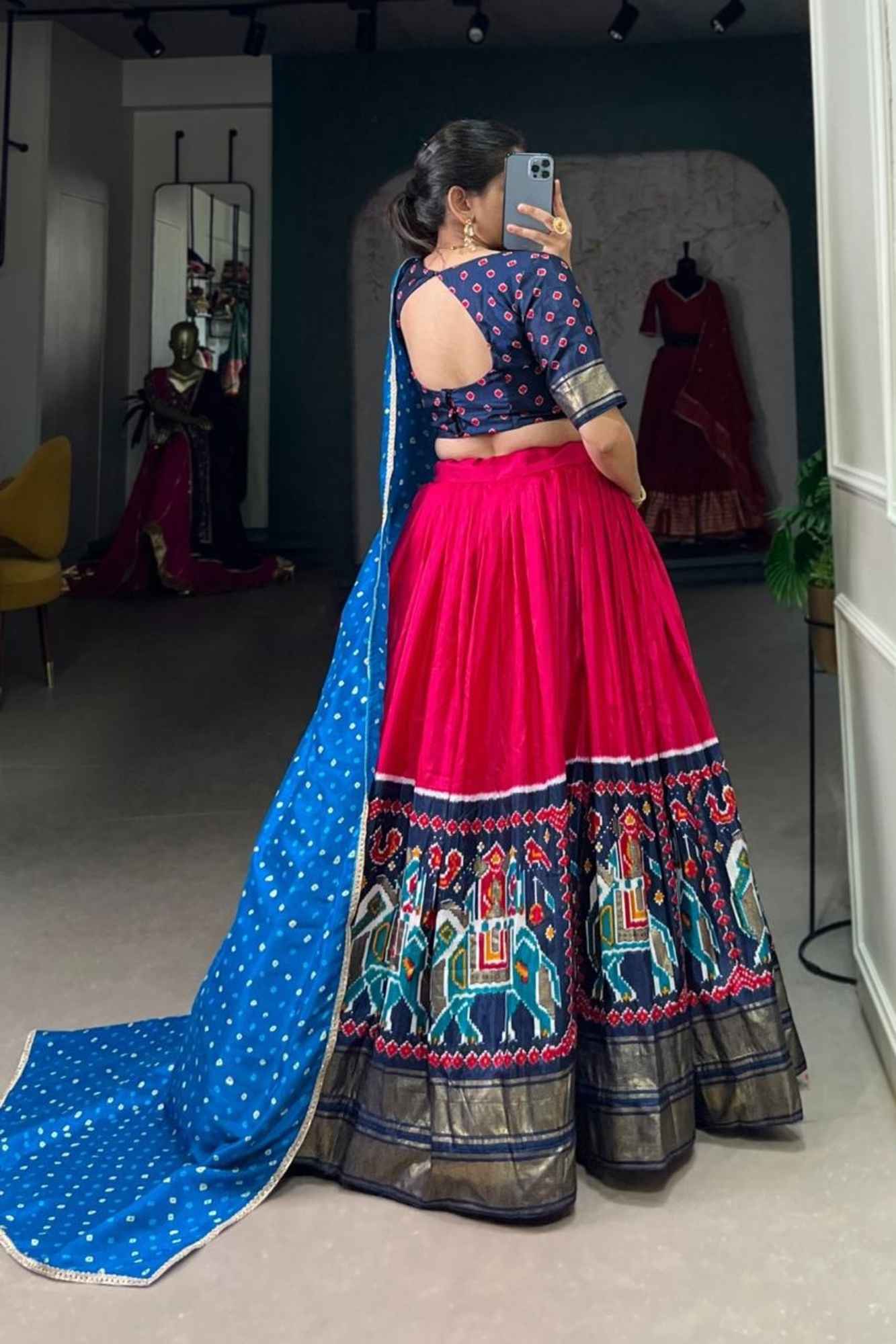 Vibrant Fuchsia Lehenga with Rajasthani Motif Border & Blue Bandhani Dupatta