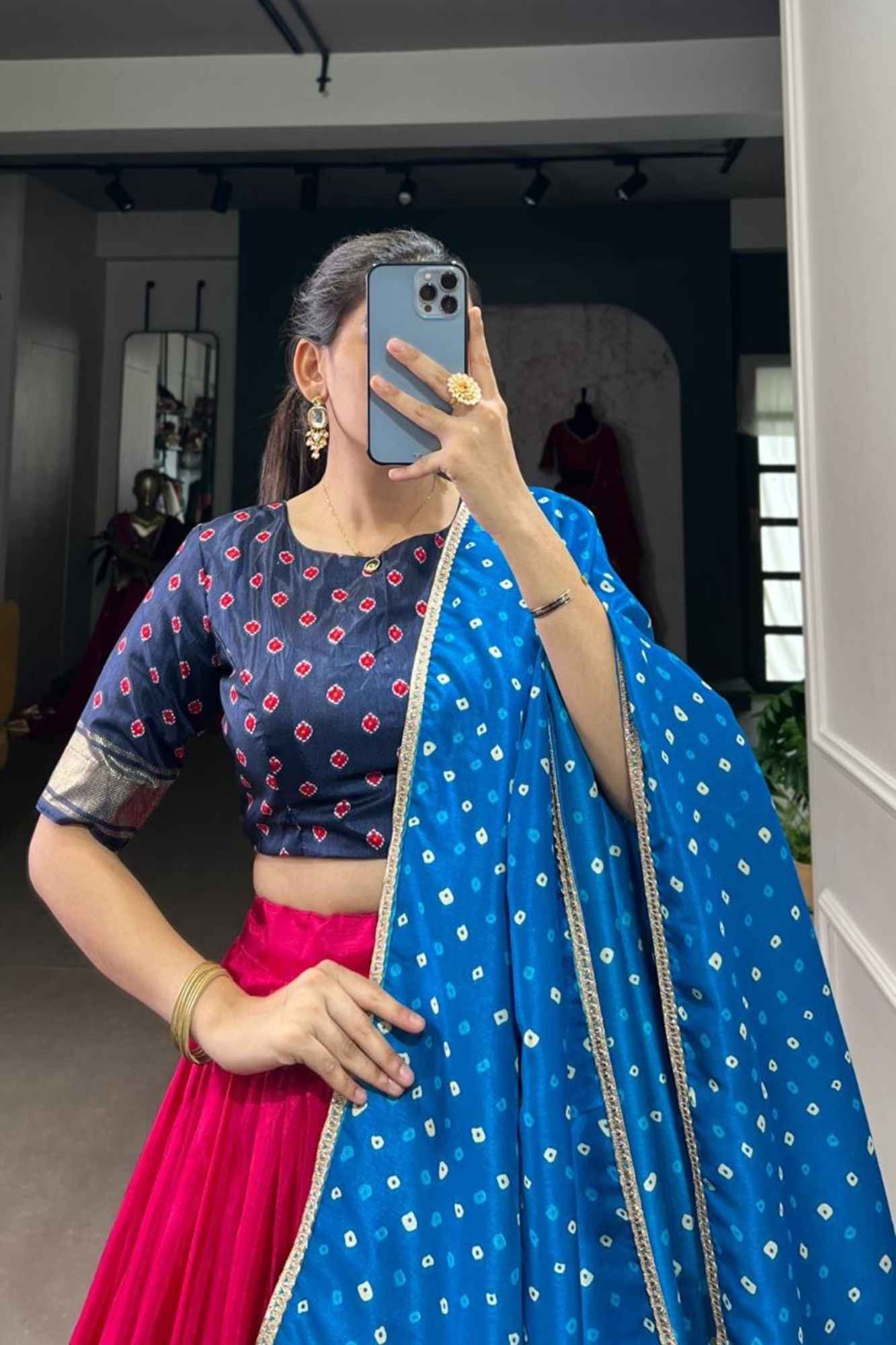 Vibrant Fuchsia Lehenga with Rajasthani Motif Border & Blue Bandhani Dupatta