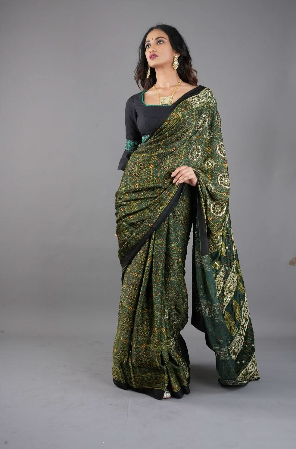 Ajrakh Hand Block Print on Green Modal Silk Saree with mirror and sequins Hand embroidery | Shobitam