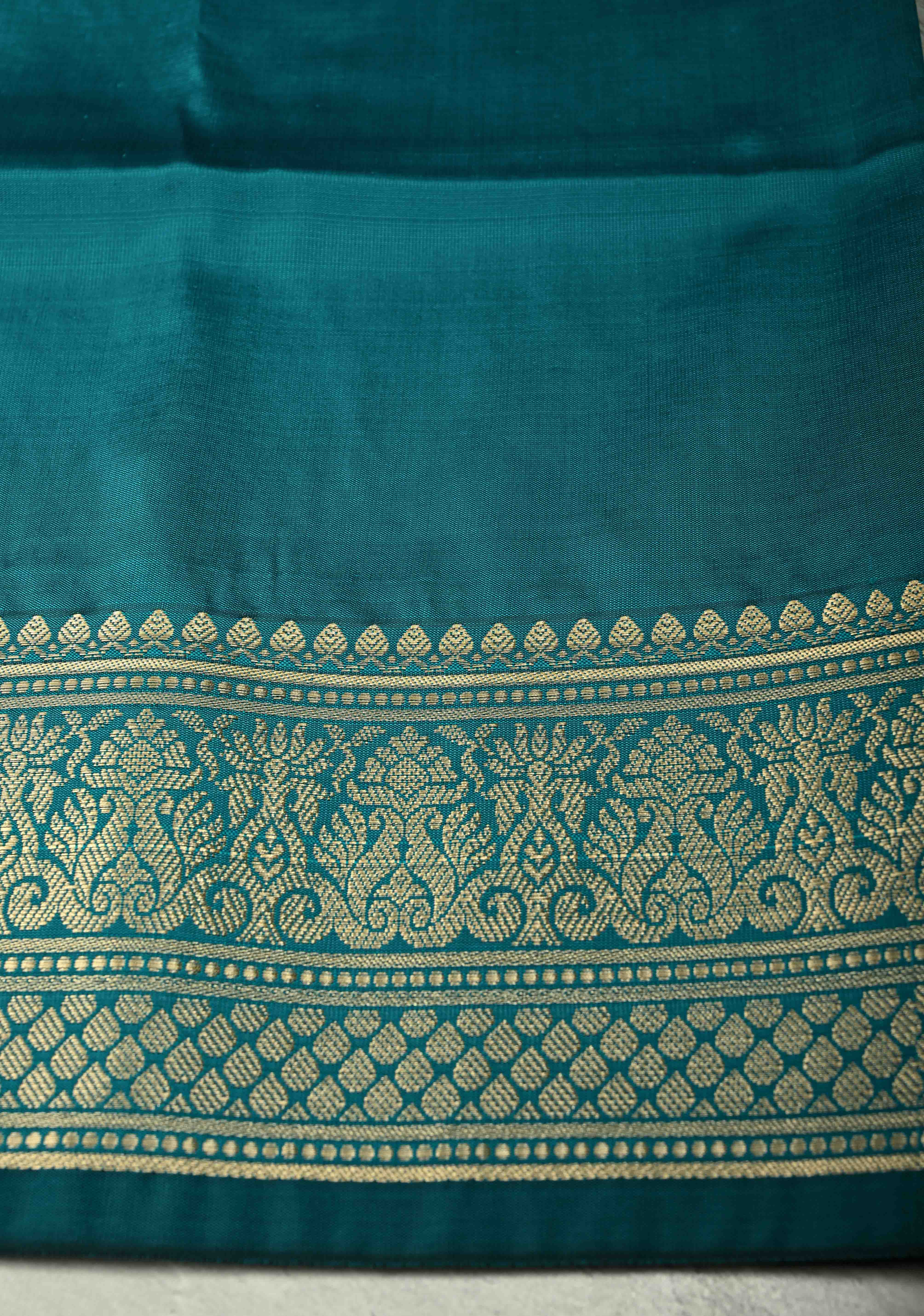 Persian Green Semi Silk Saree with Floral Zari Border, Brocade Blouse Piece | Shobitam