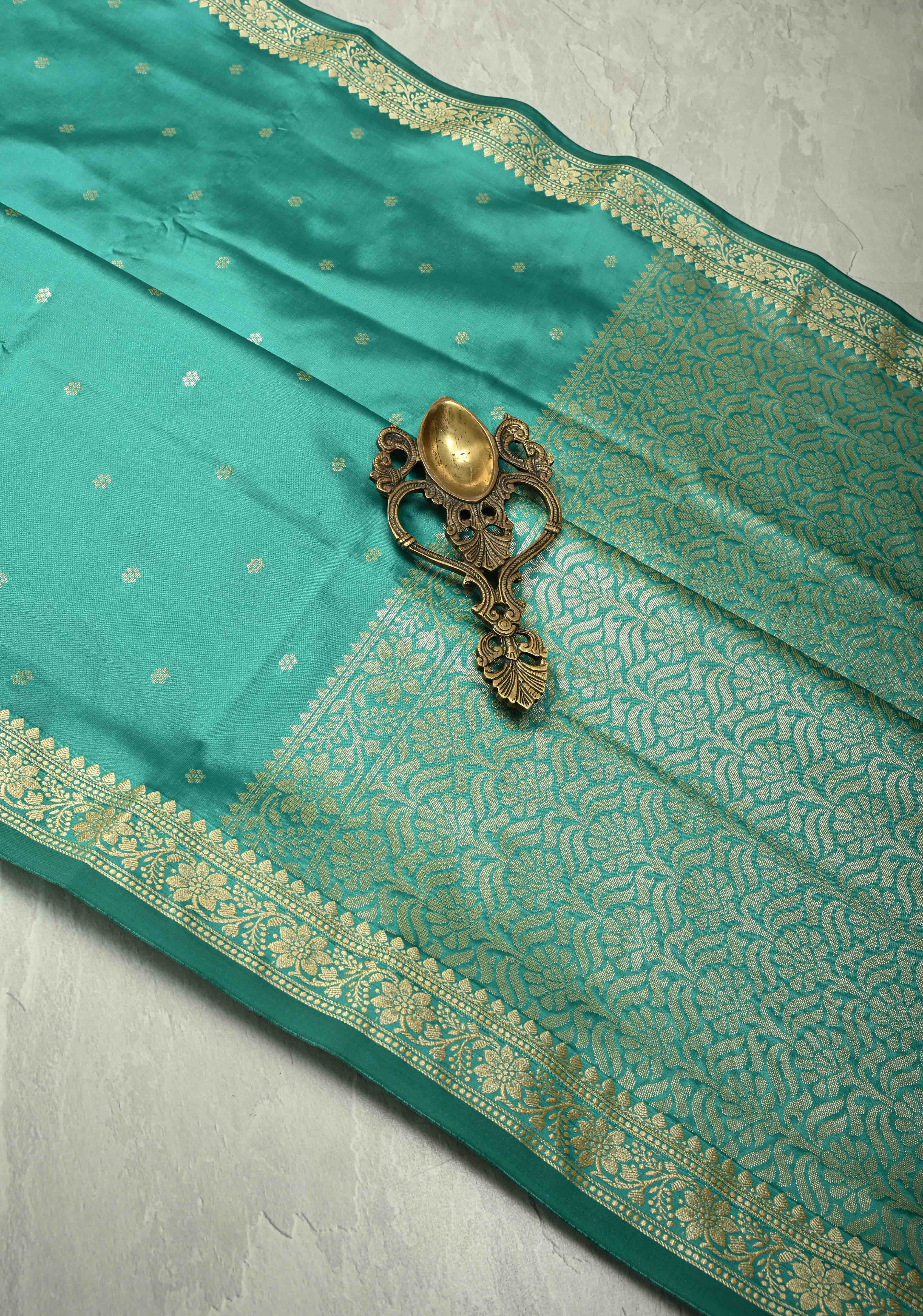 Dark Mint Semi Silk Saree with Chunri Buttis and Minimal Zari Border
