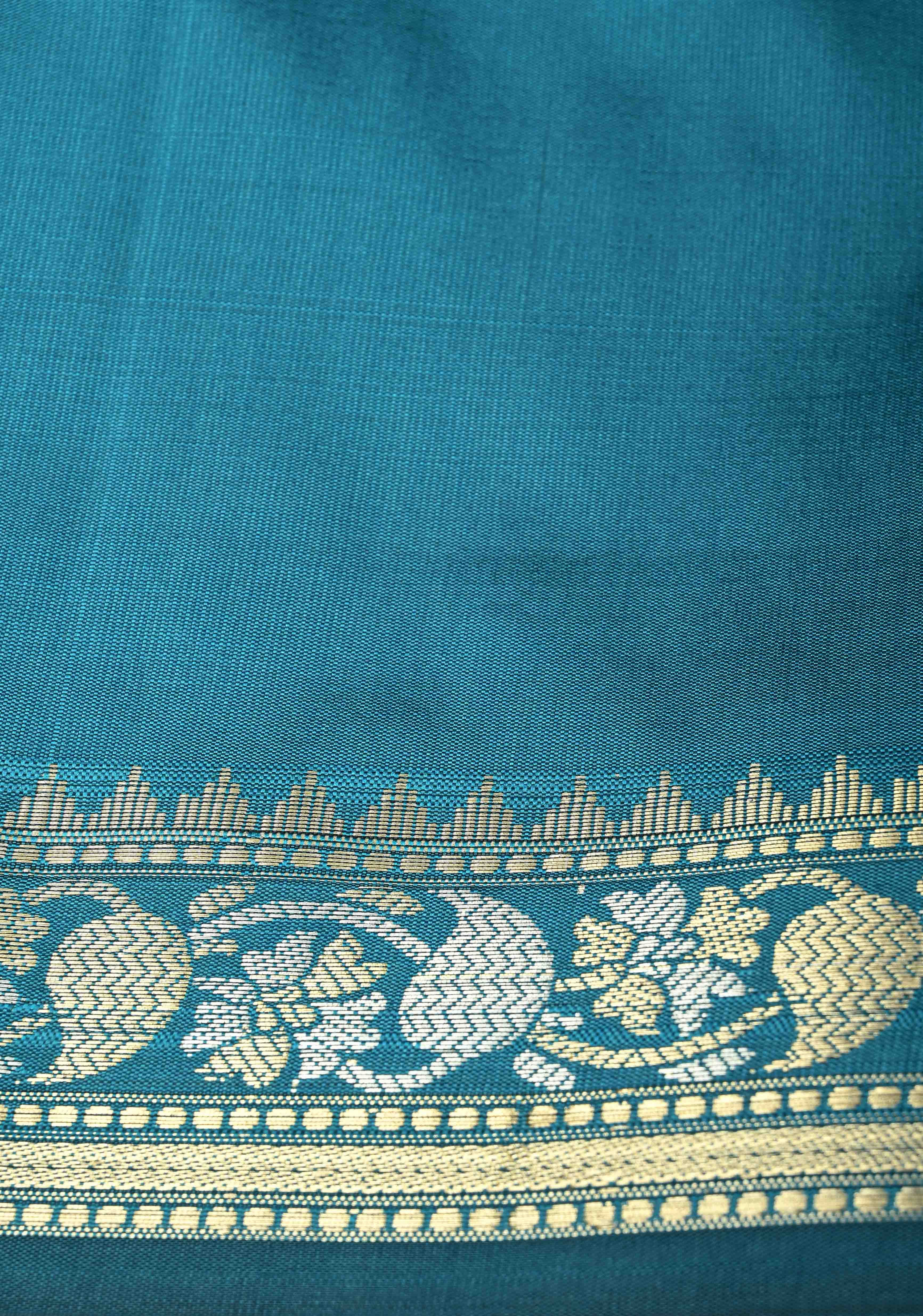 Peacock Blue Semi Silk Saree with Floral Buttis and Alfi Zari Border | Shobitam
