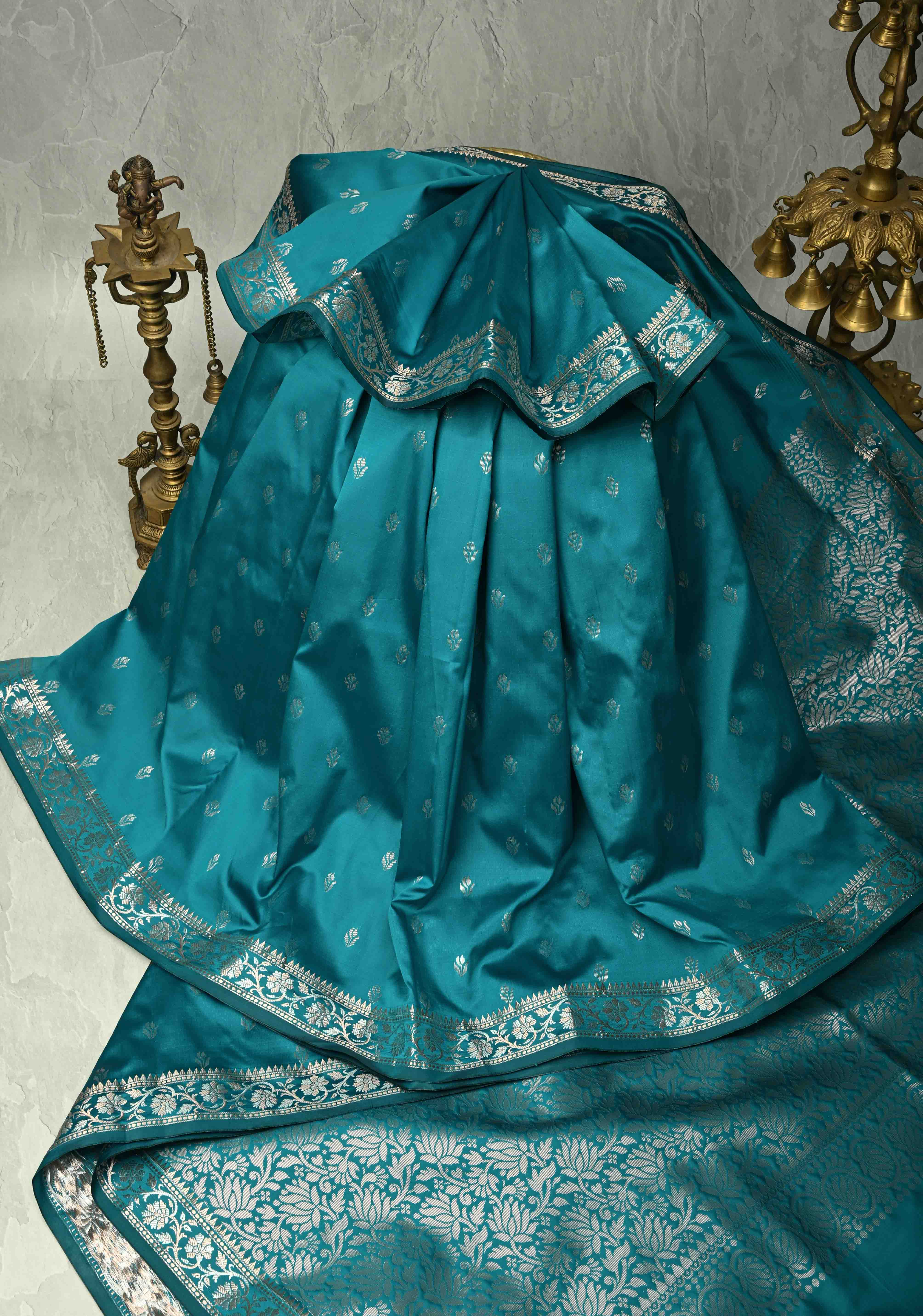 Teal Blue Semi Silk Saree with Floral Buttas and Alfi Zari Border | Shobitam