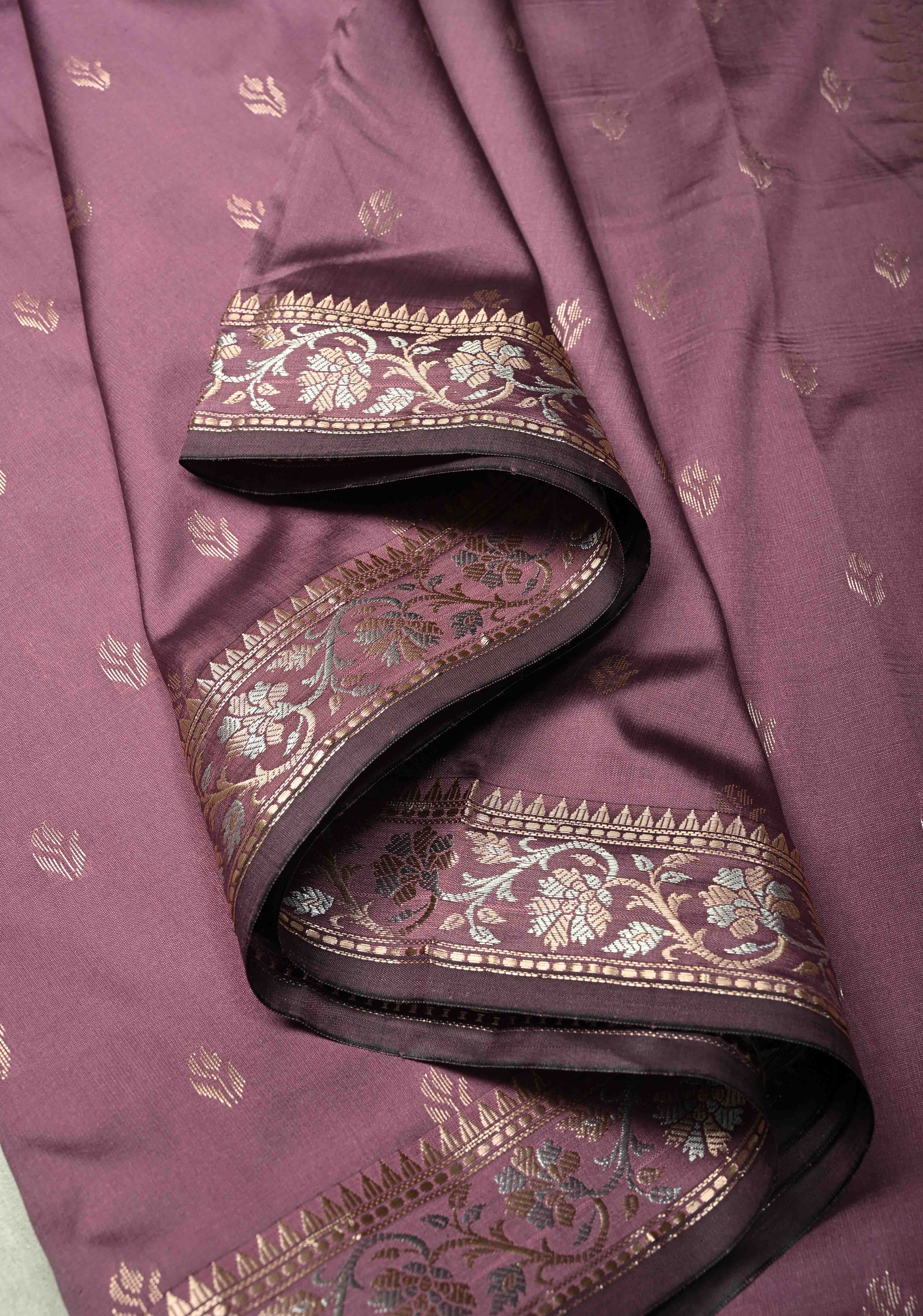 Dark Mauve Semi Silk Saree with Floral Buttas and Alfi Zari Border | Shobitam