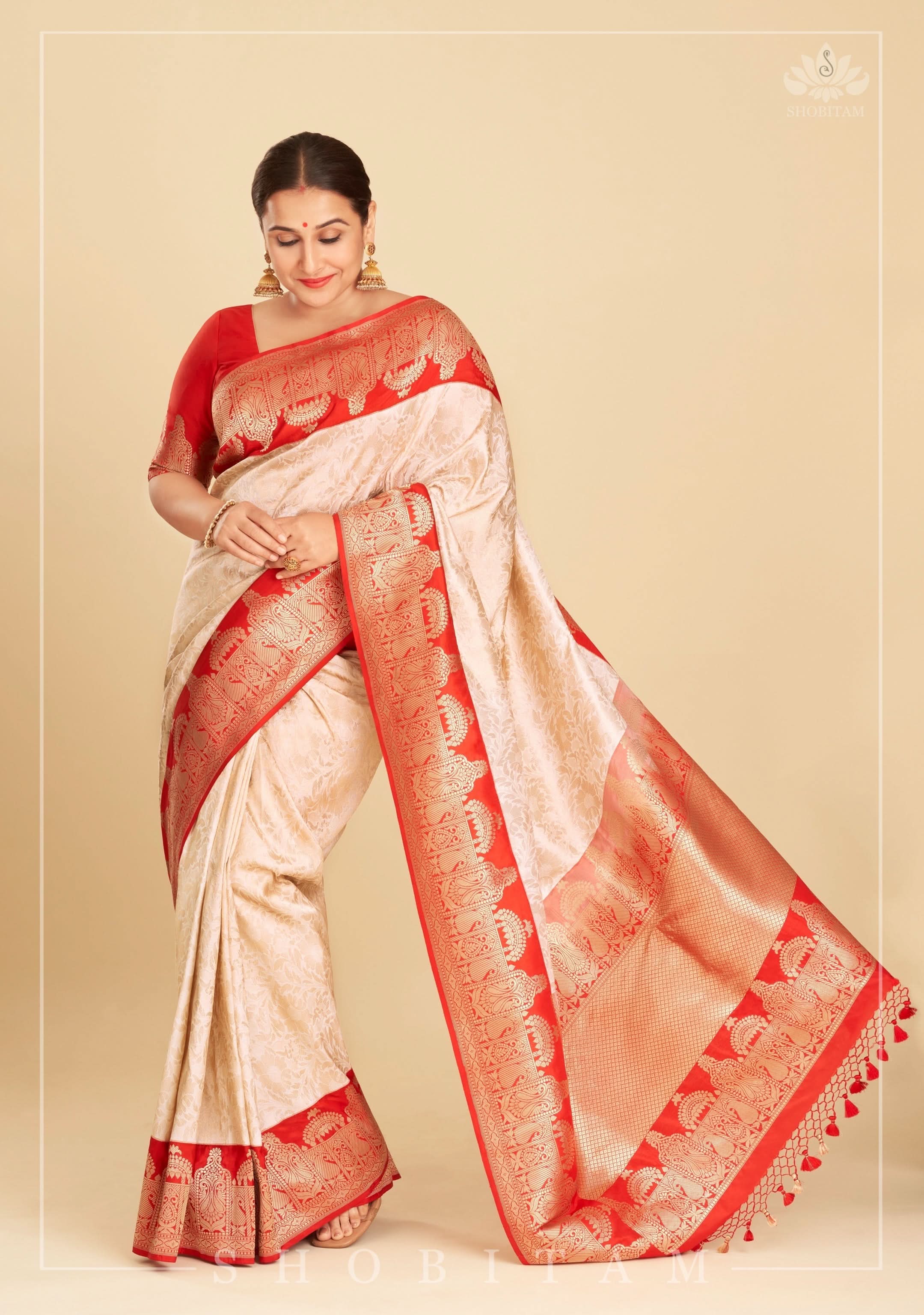 Exquisite Celebrity Brocade Banarasi Pure Katan Silk Saree in Ivory, Red & Gold with Dome Shaped Kadhiyal Borders, Grand Pallu and Zari | SILK MARK CERTIFIED