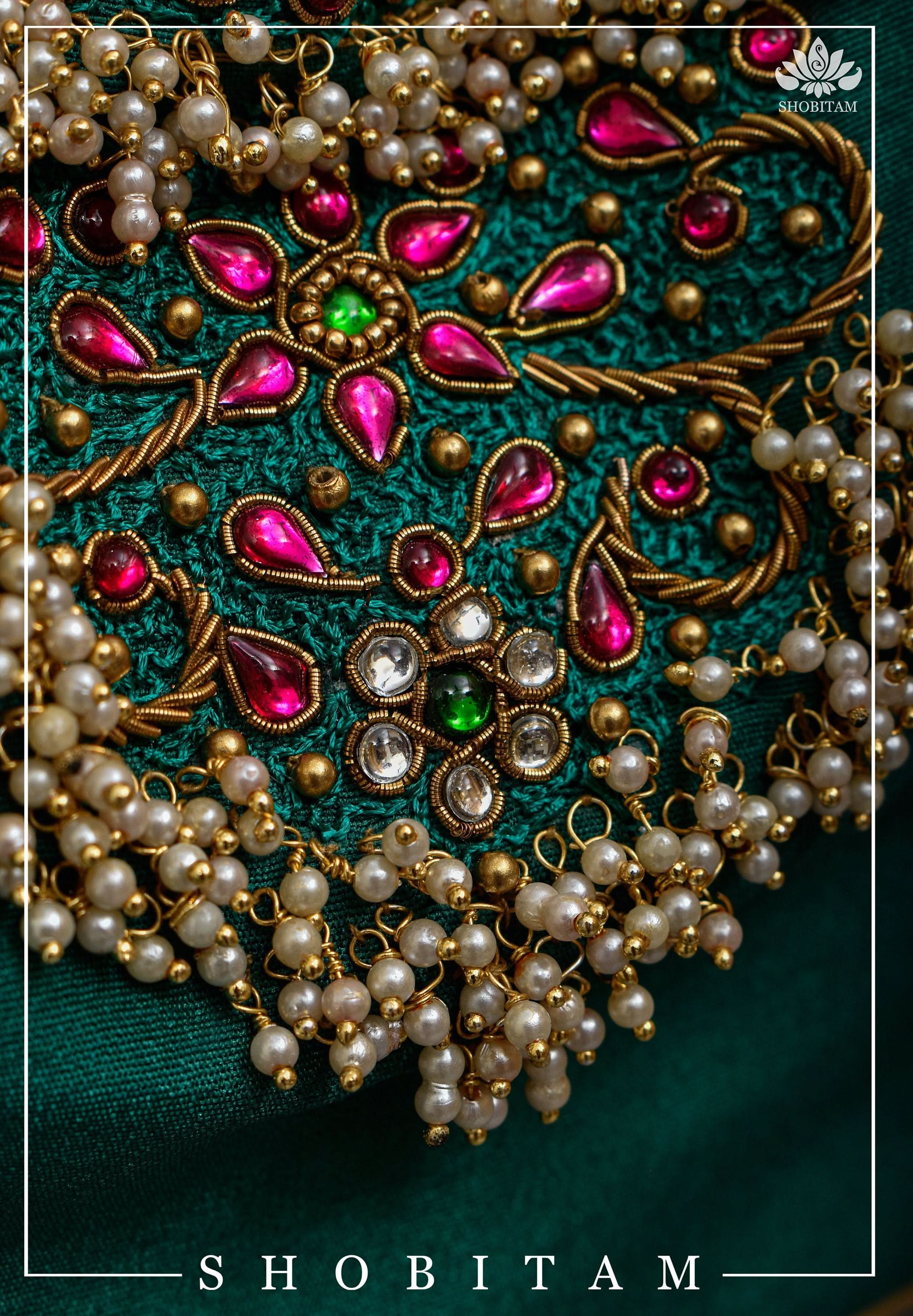 Made to Order: Necklace Design Jadau Ornamental Sleeveless Blouse in Green Raw SIlk | Shobitam Blouse