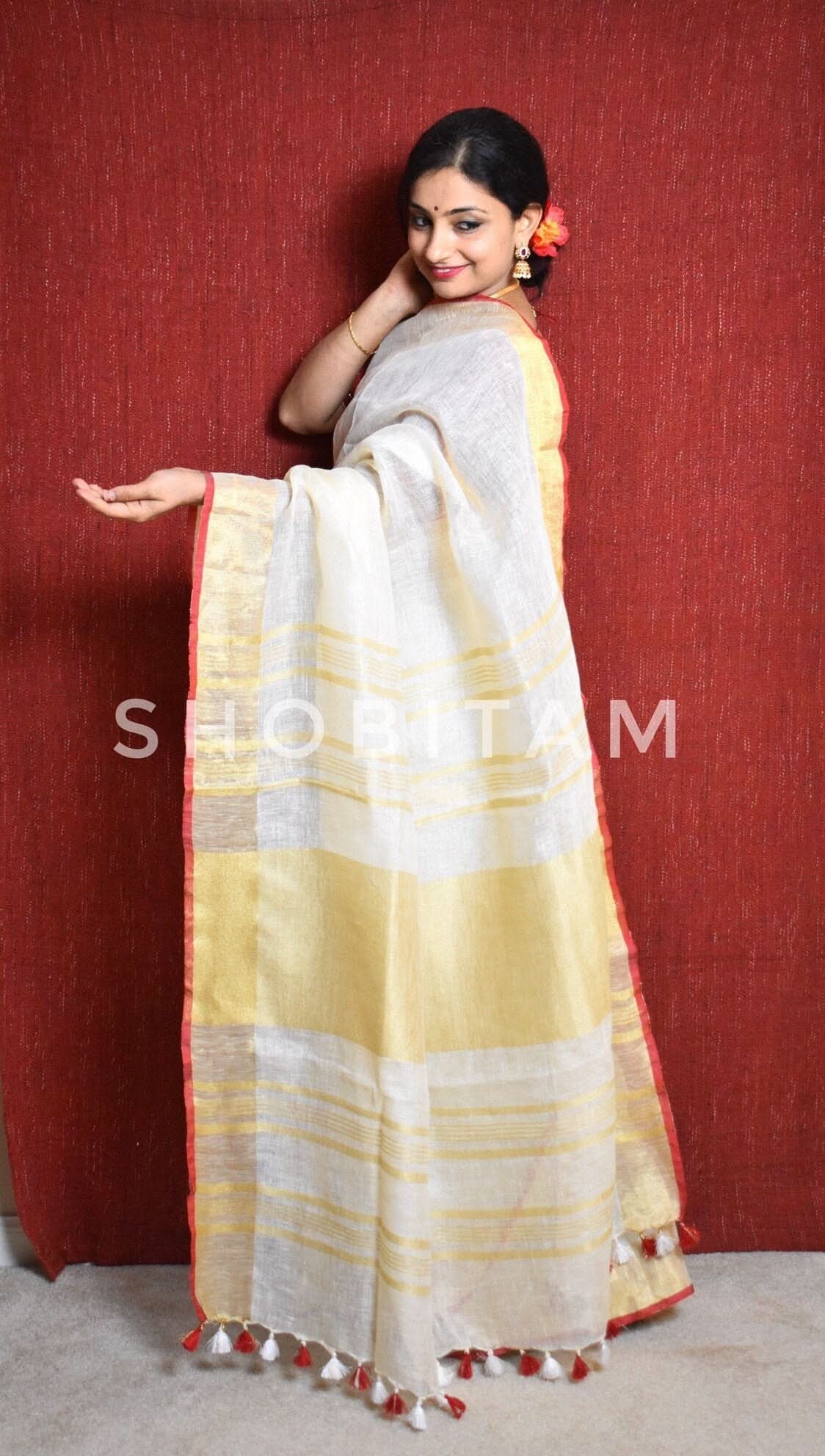 Ivory Linen by Linen saree with Red-Gold Border | Shobitam