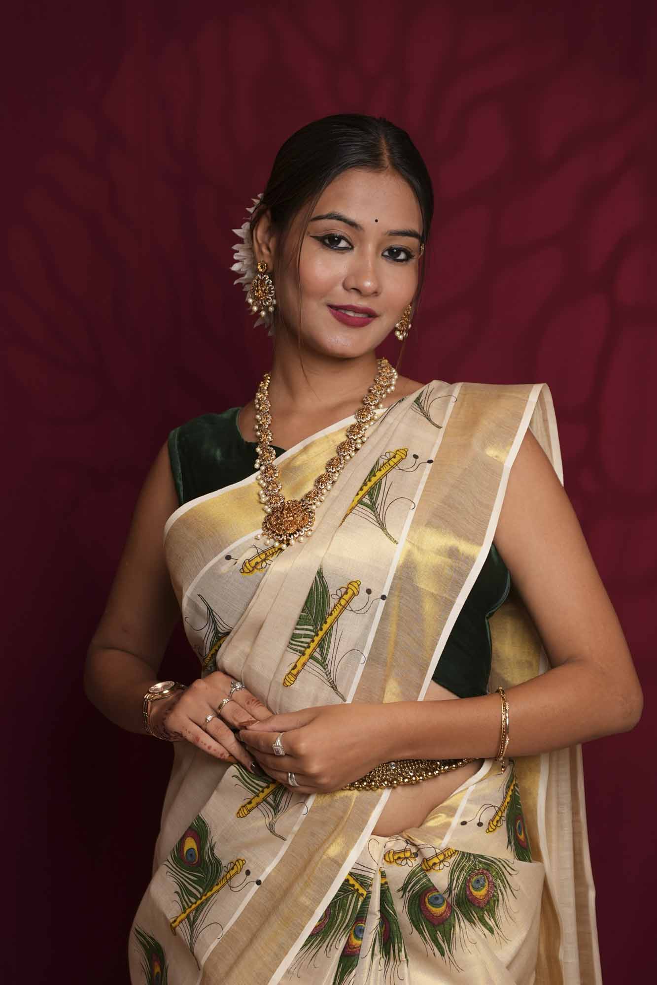Off-White Kasavu with Peacock Feather & Flute Print and Golden Zari Border Ready To Wear Saree