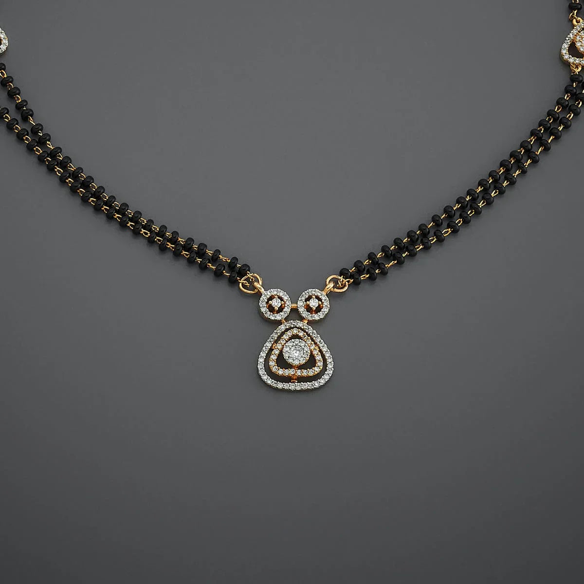 Elegant Double-Strand Black Bead Mangalsutra with Sparkling Zircon Pendants and Accent