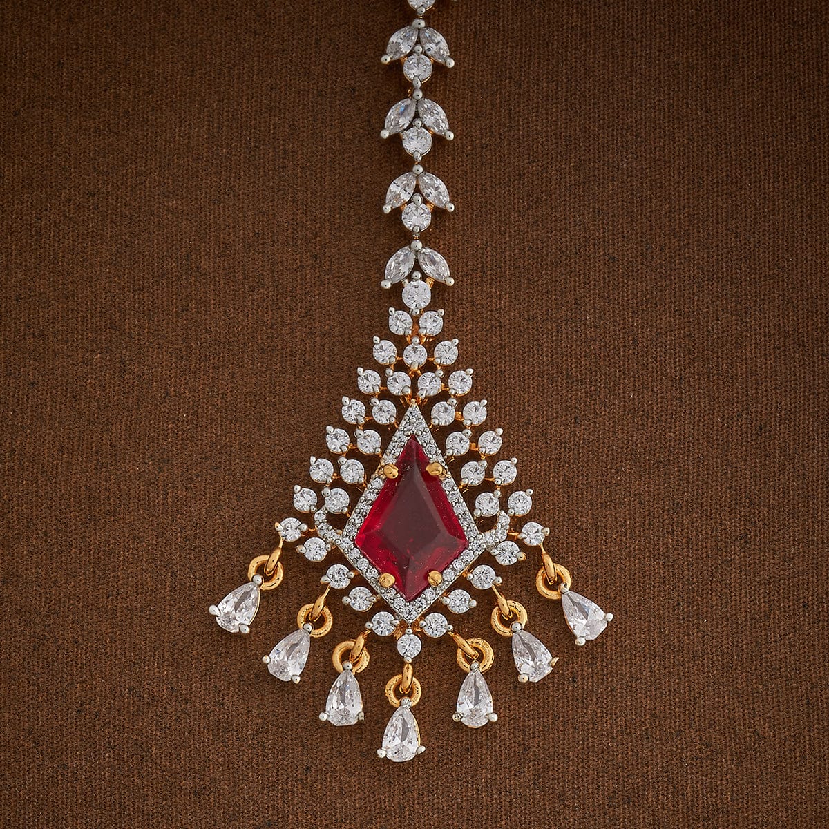 Handcrafted Tikka embellished with synthetic stones in White and Ruby | Shobitam
