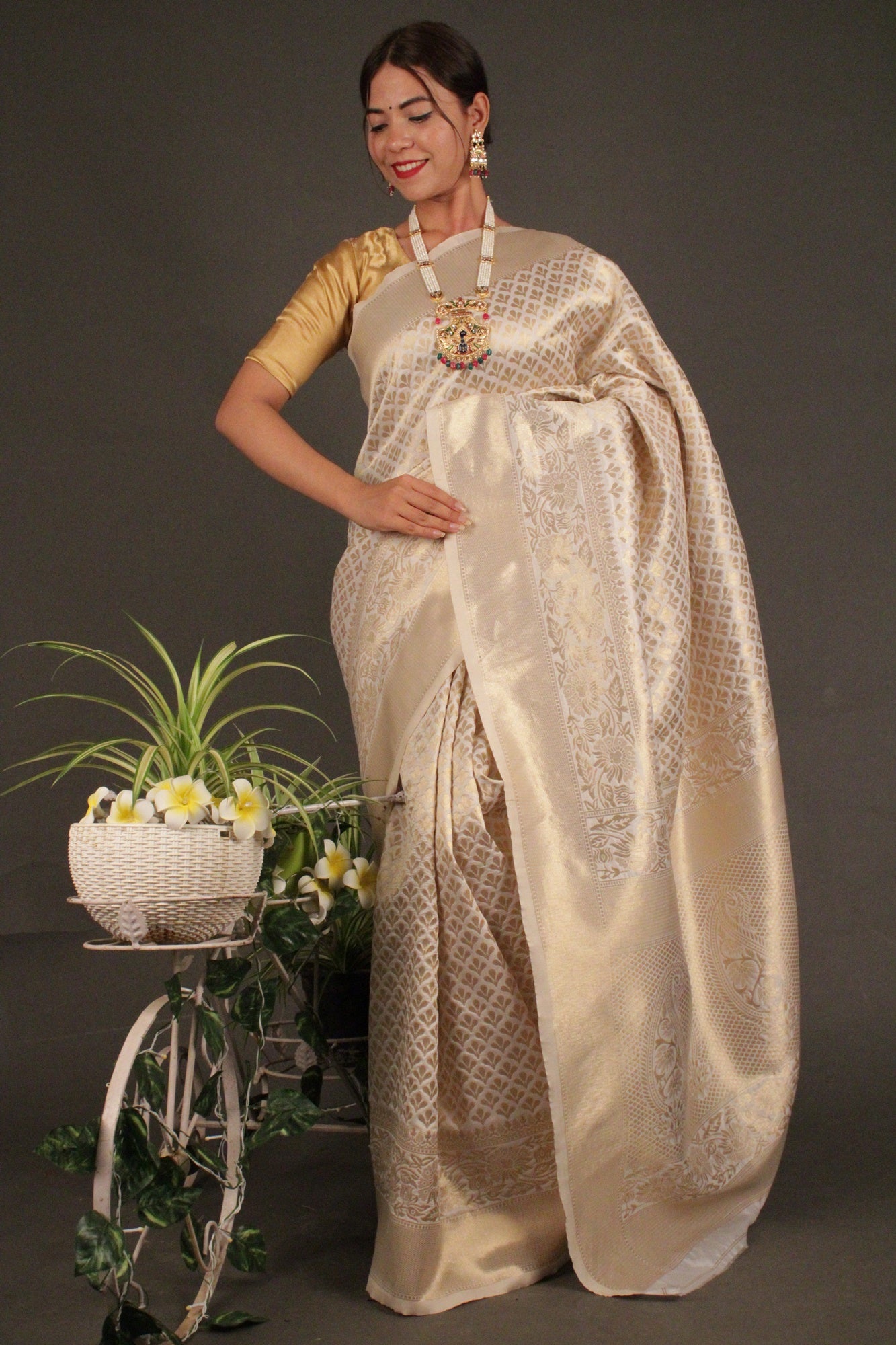 Off white shop and gold saree