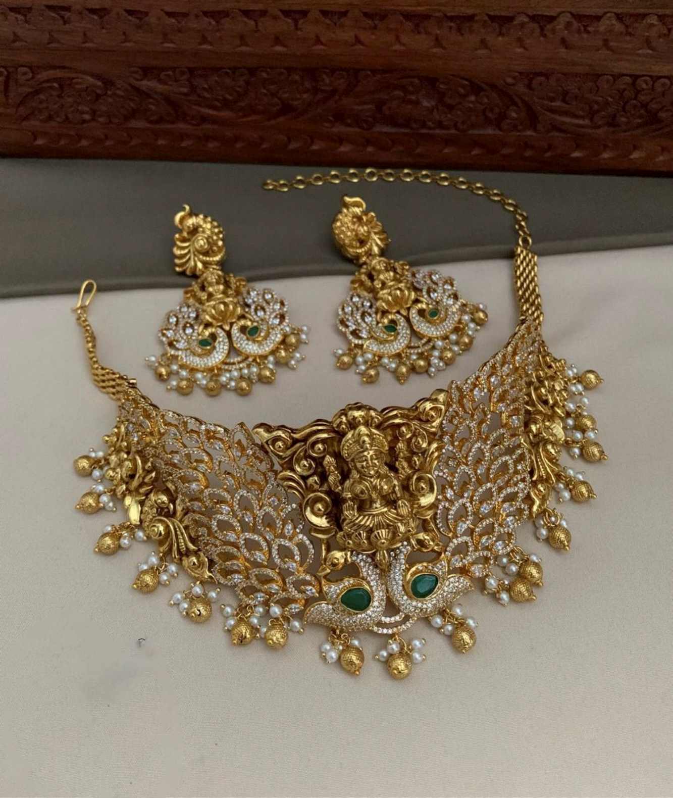 Exquisite Necklace Set with Maa Annapurna Goddess in middle with Peacock Golden Jewelry Set