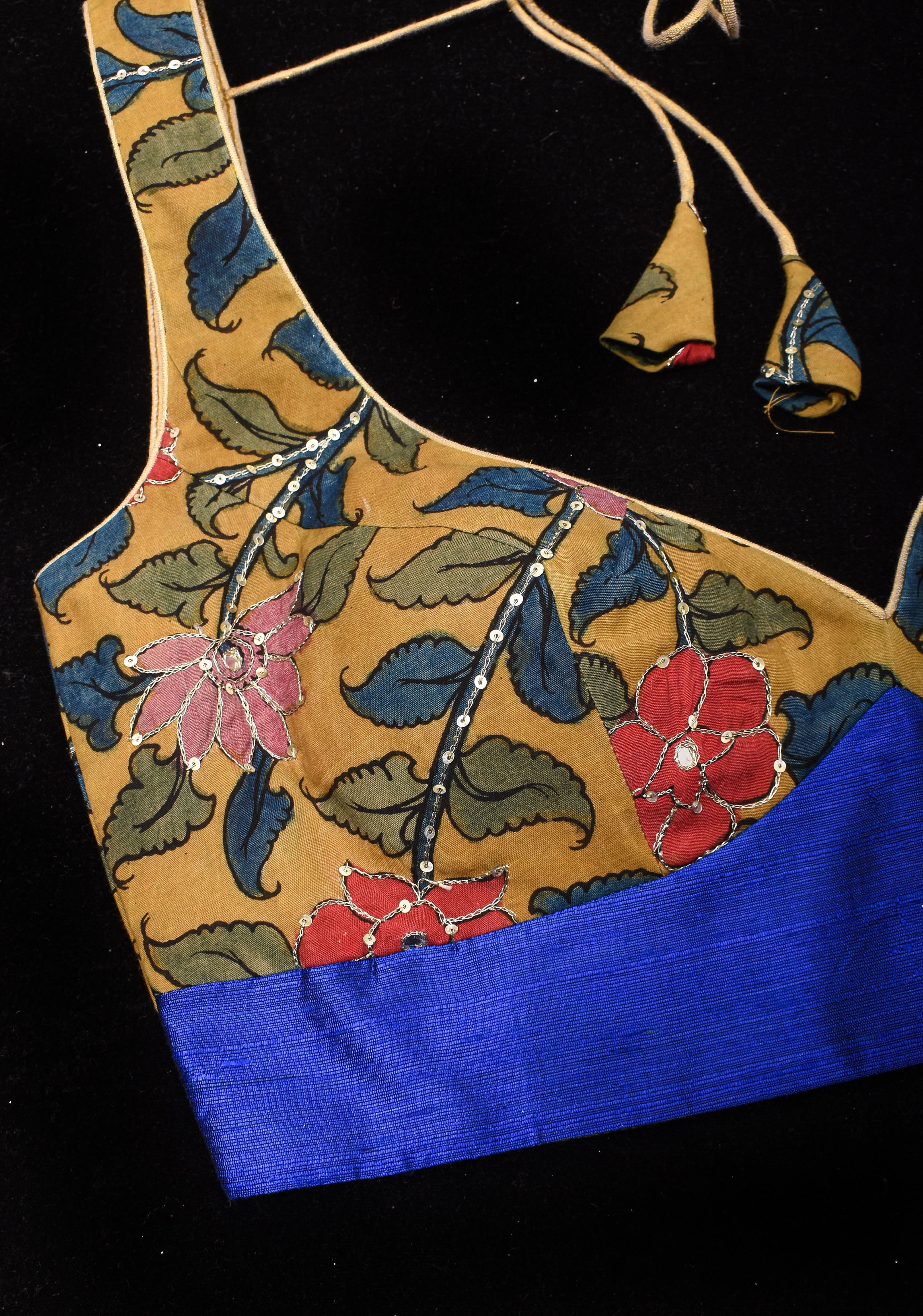 Pen Kalamkari Plunge Neck Blouse in Yellow with light sequin work and blue raw silk contrast, Made to Order | Shobitam