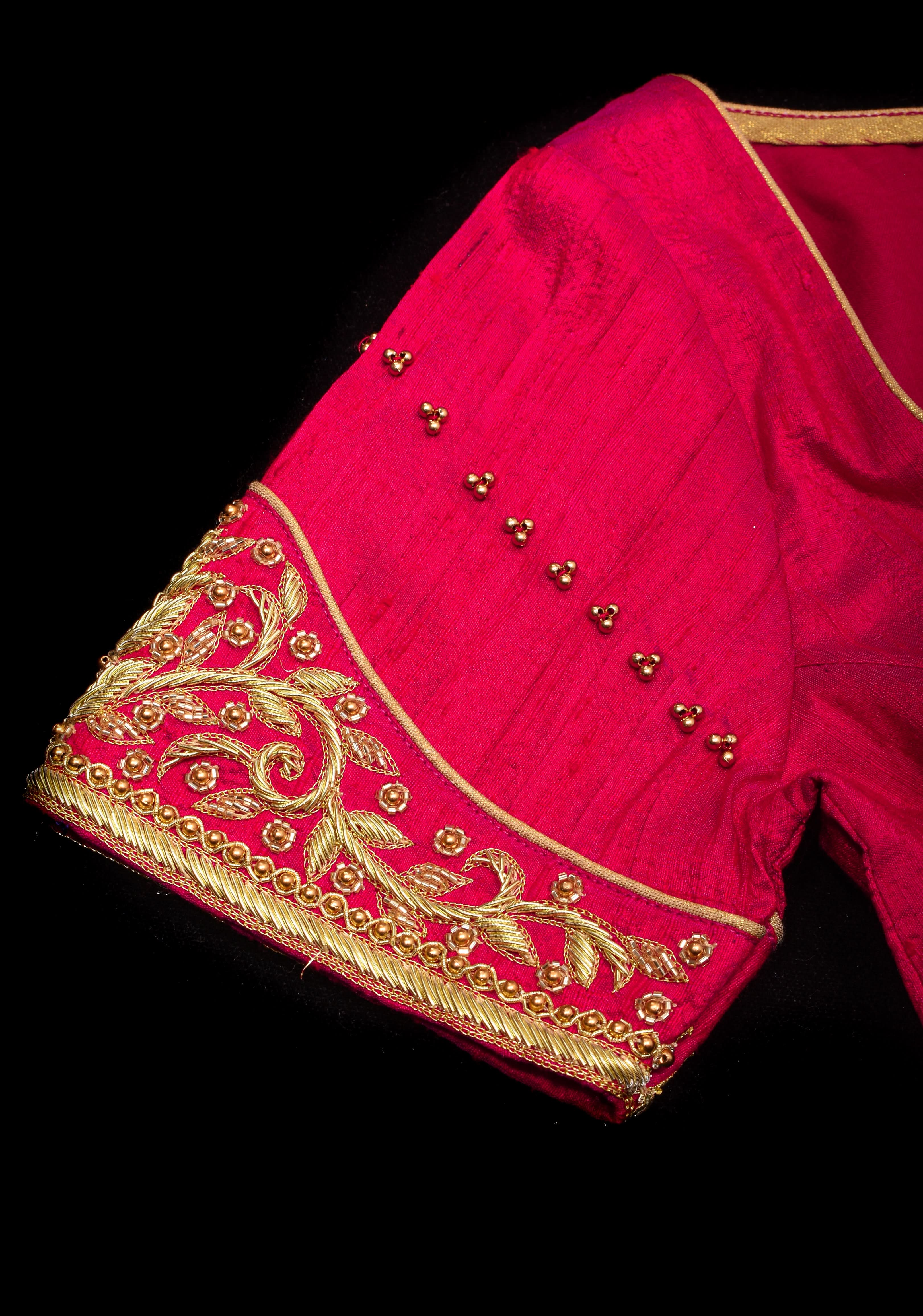 Rani Pink Pure Raw Silk Blouse with Pleated Puff Sleeves and Zardosi Detailing on sleeves and back | Shobitam
