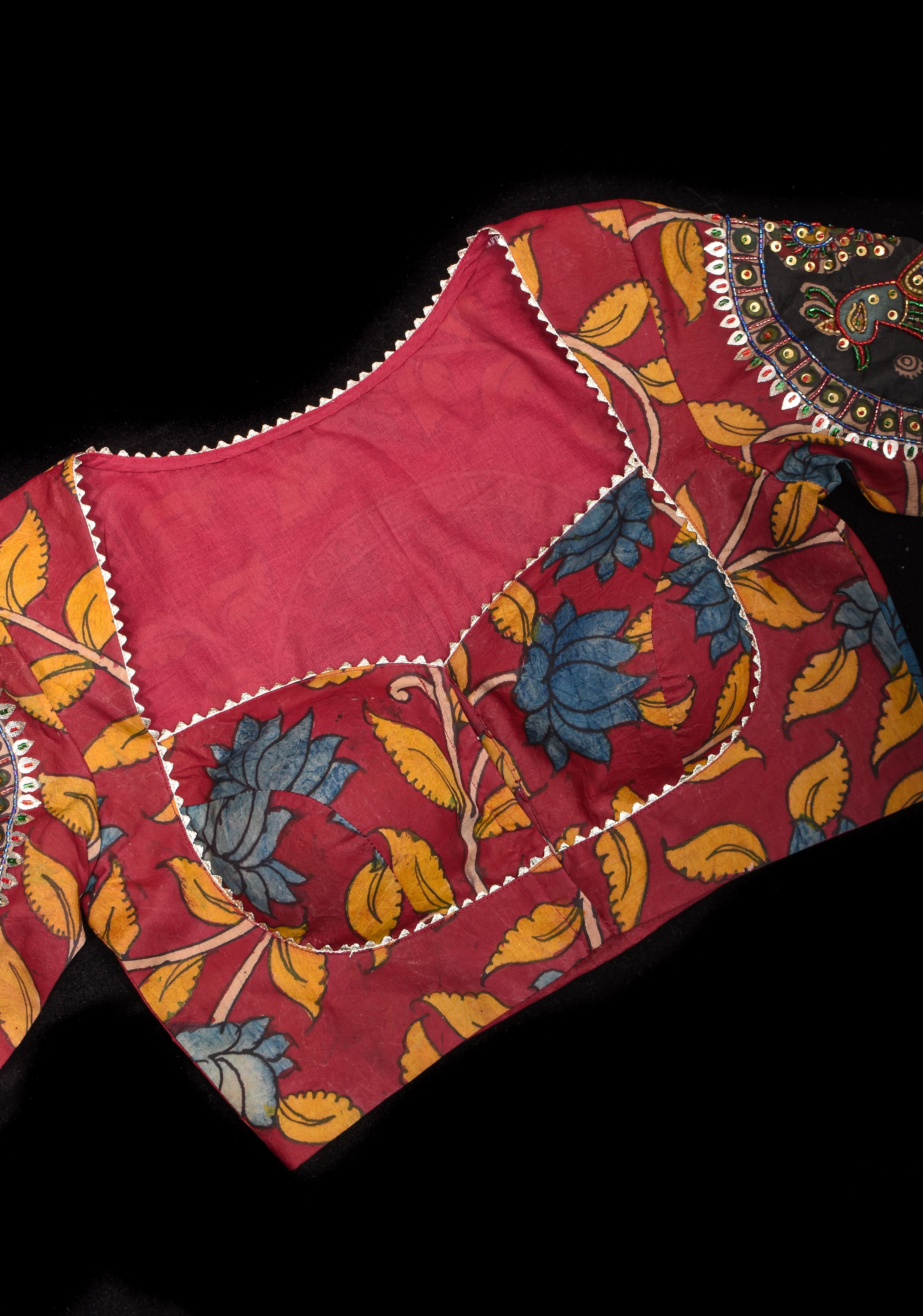 Red Kalamkari blouse with peacock designs, and cutdana, gotta and sequins handwork | Shobitam