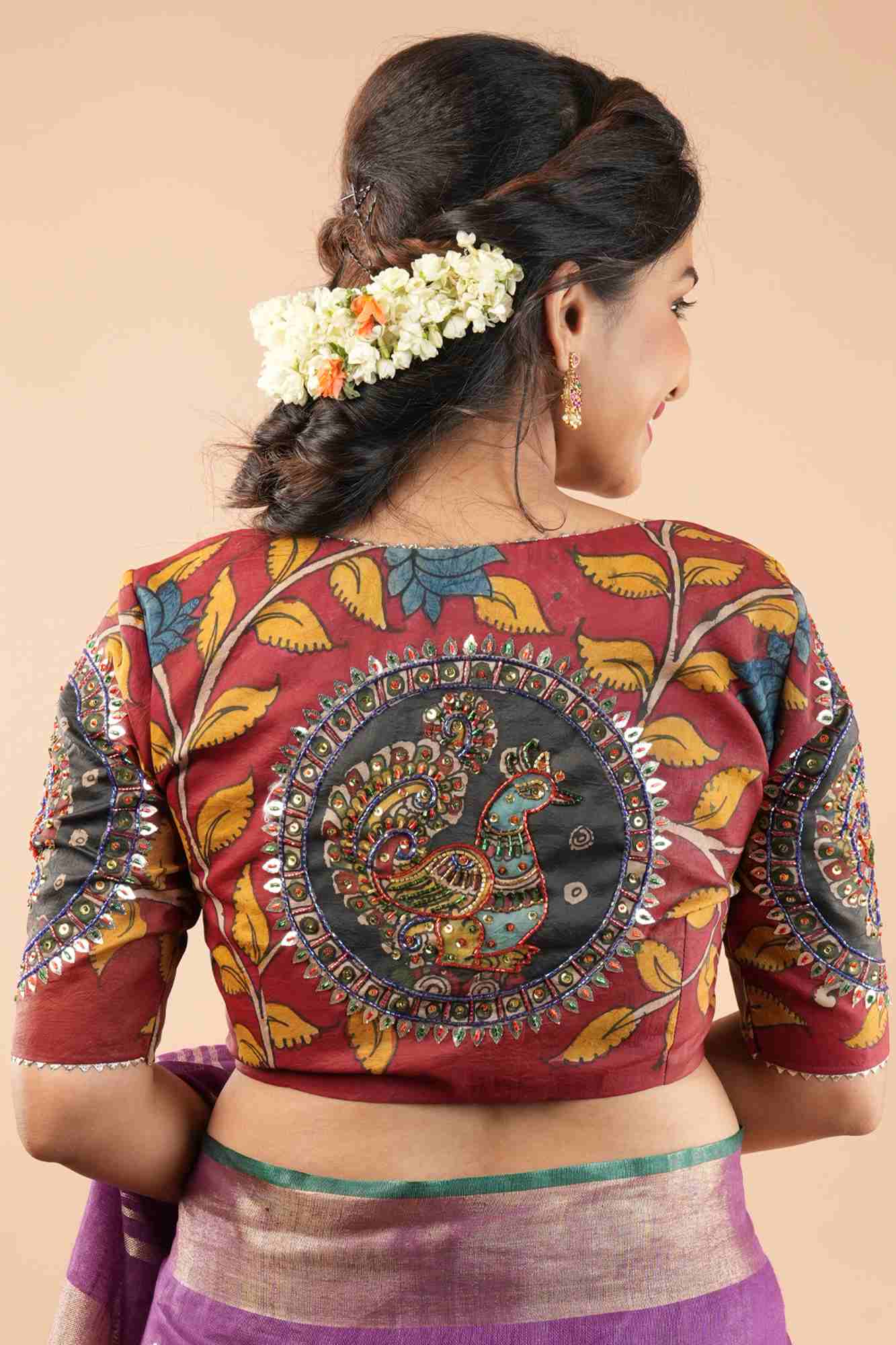 Red Kalamkari on silk blouse with sequin gotta and cutdana embelishments