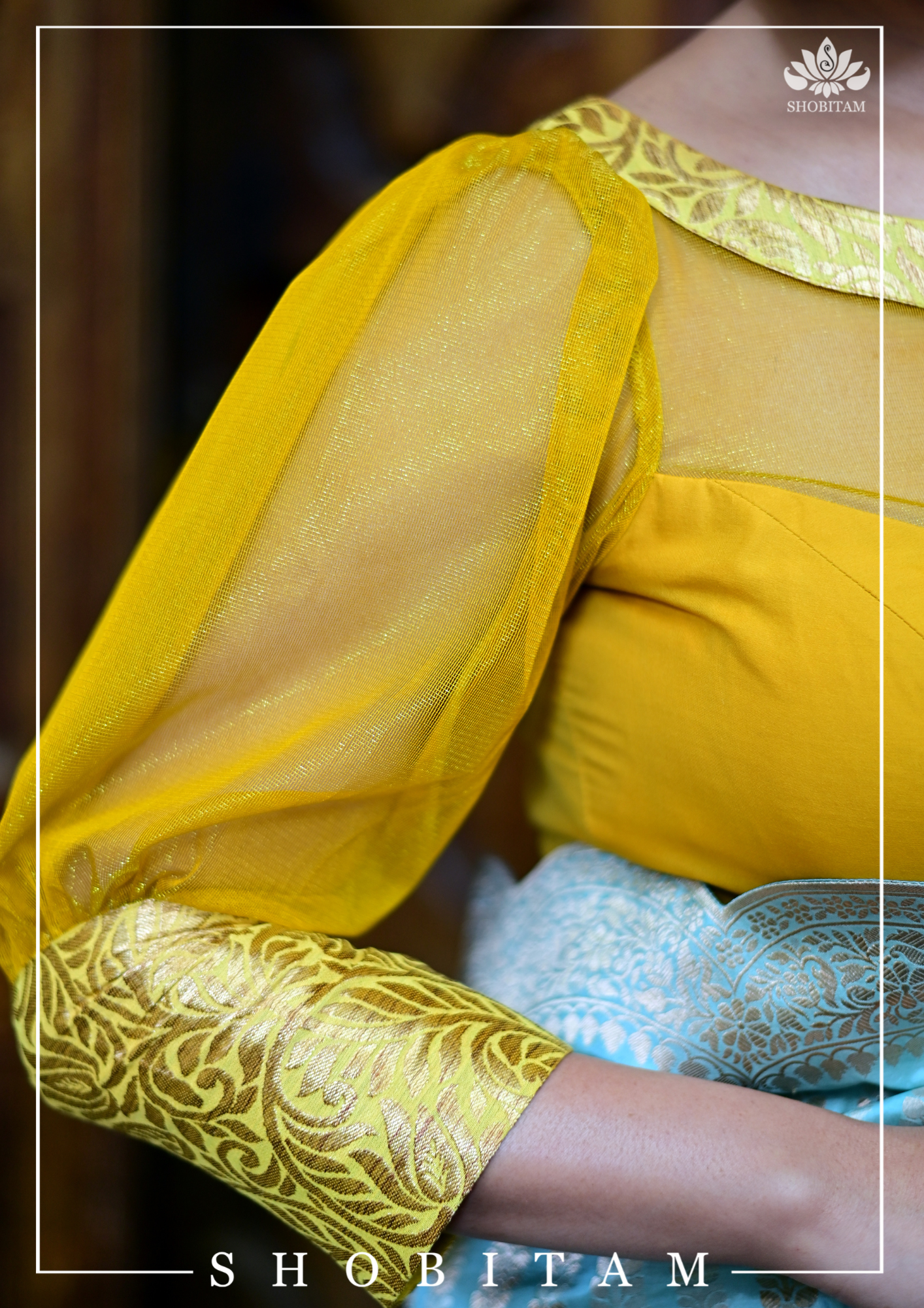 Mustard boat neck Blouse with Sheer Yoke and Puff Sleeves, Banarasi Brocade Detailing | Shobitam