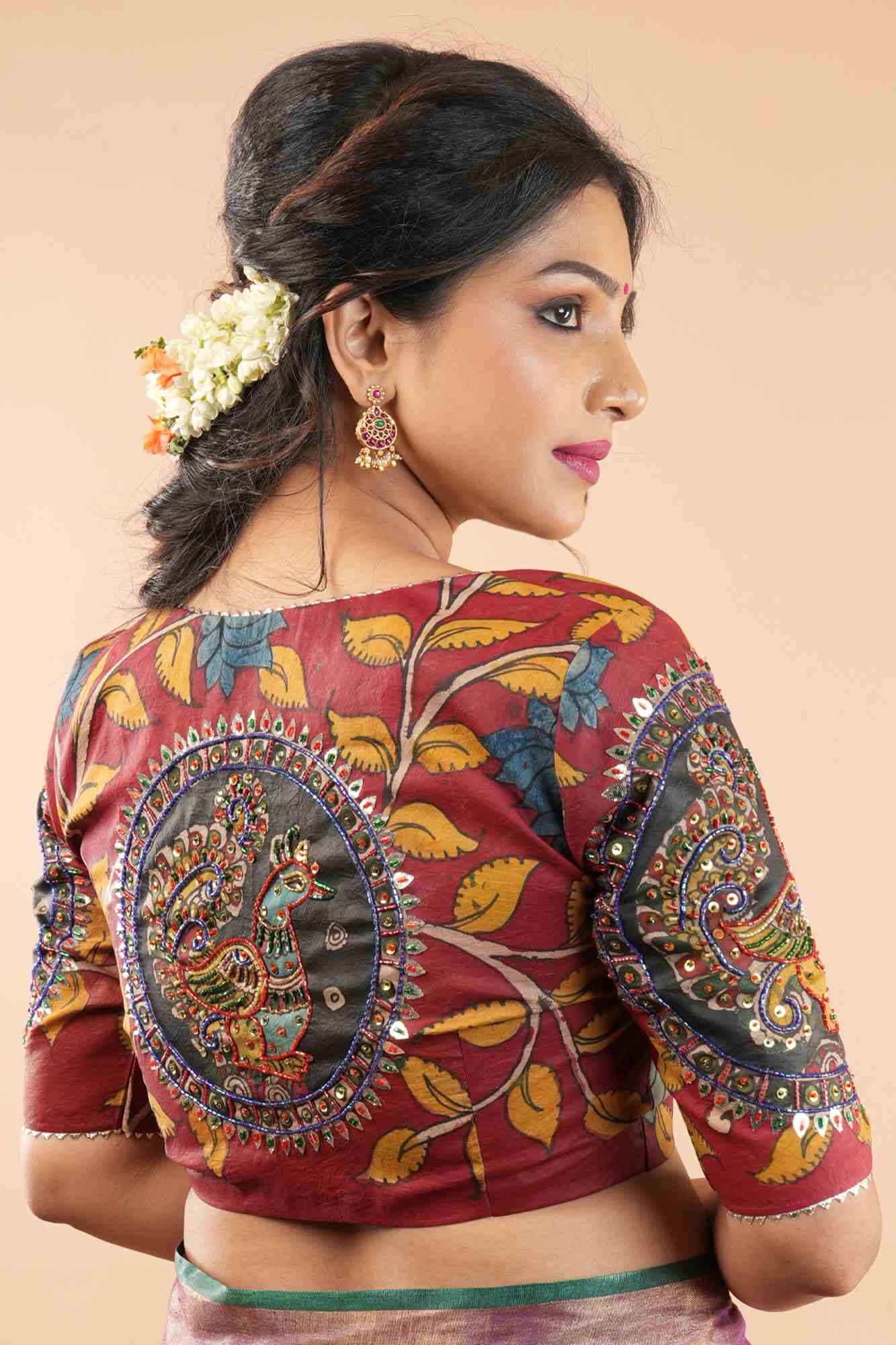 Red Kalamkari on silk blouse with sequin gotta and cutdana embelishments