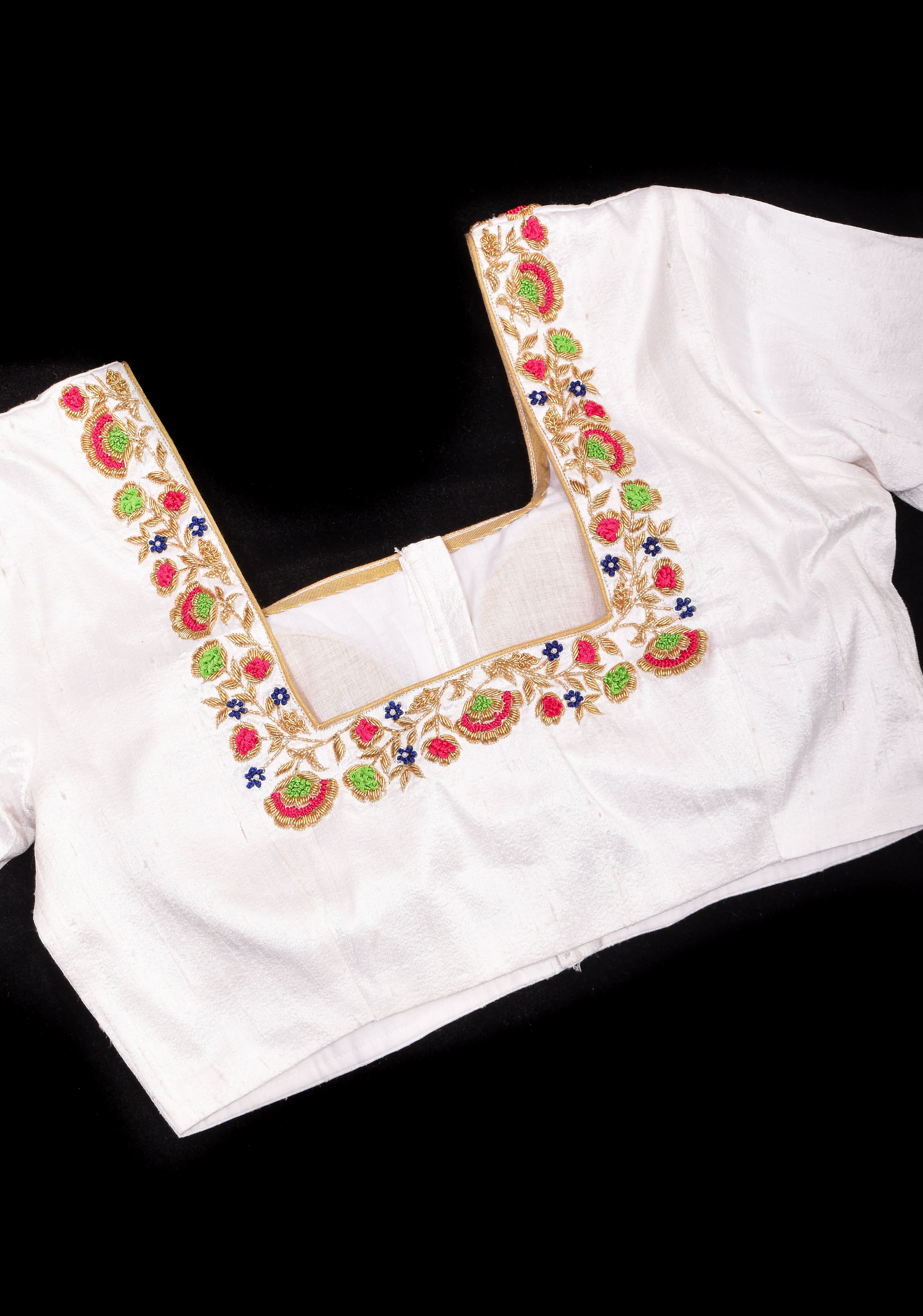 Off White Pure Raw Silk Blouse with multicolor Resham Hand Embroidery | Shobitam