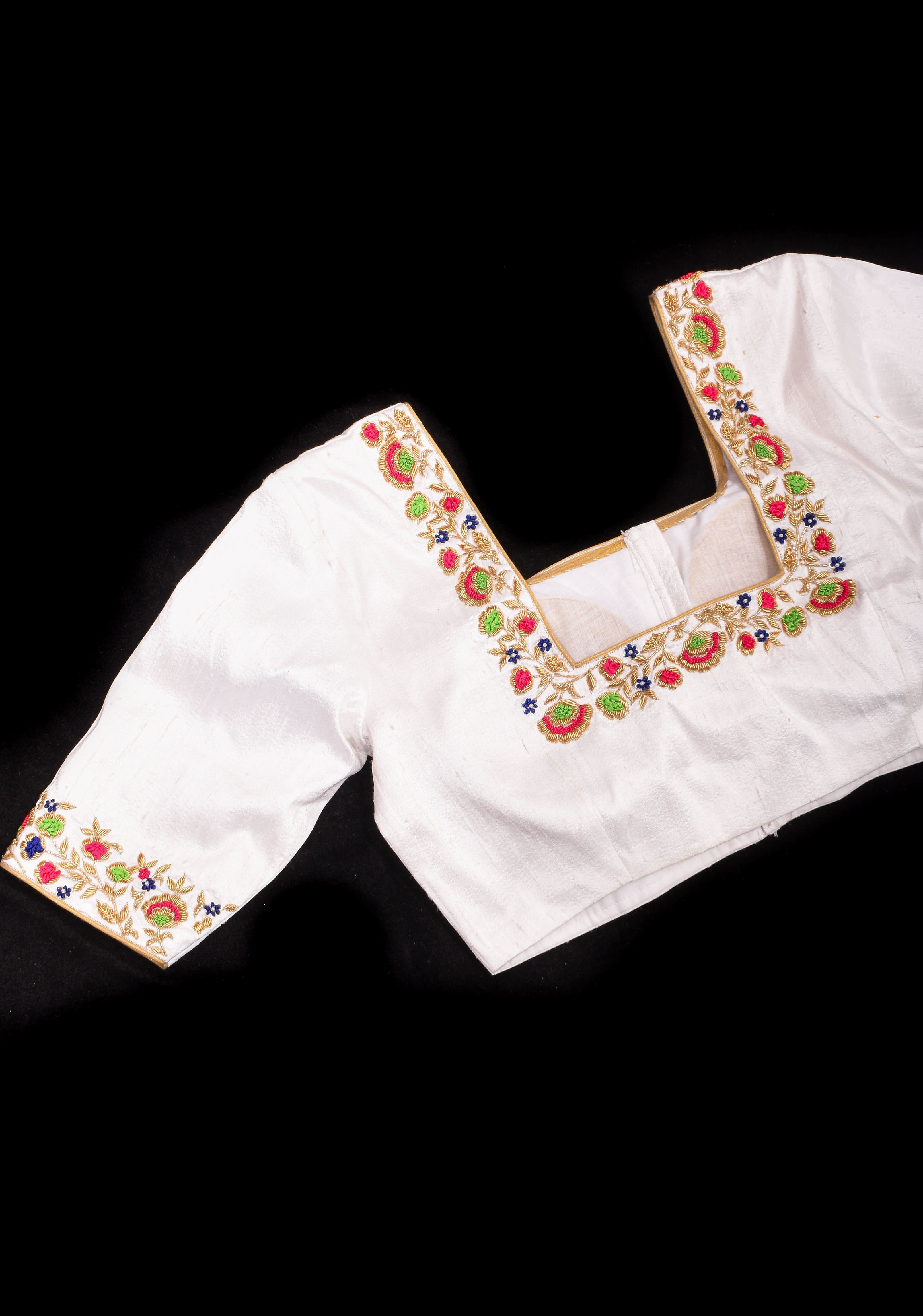 Off White Pure Raw Silk Blouse with multicolor Resham Hand Embroidery | Shobitam