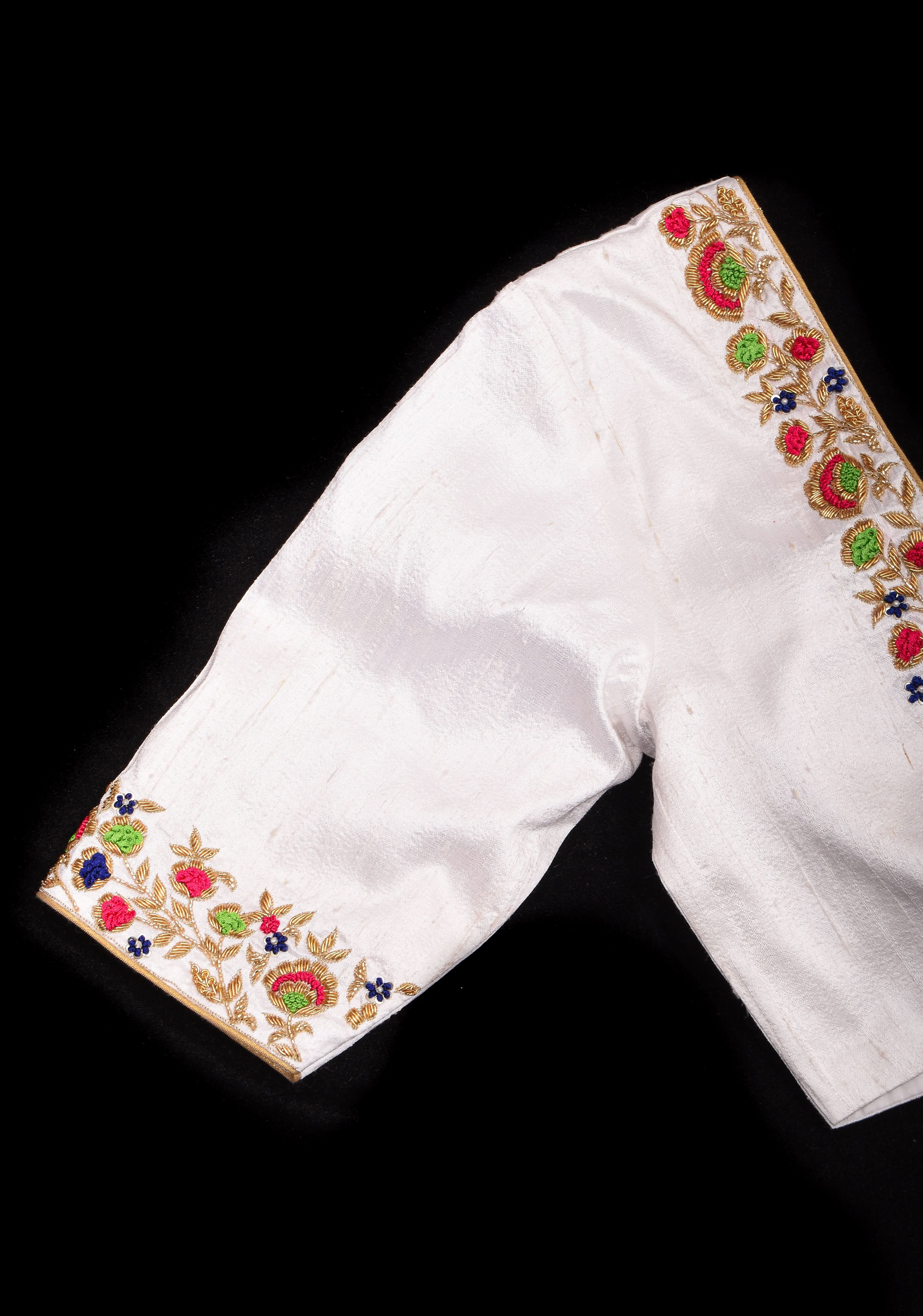 Off White Pure Raw Silk Blouse with multicolor Resham Hand Embroidery | Shobitam