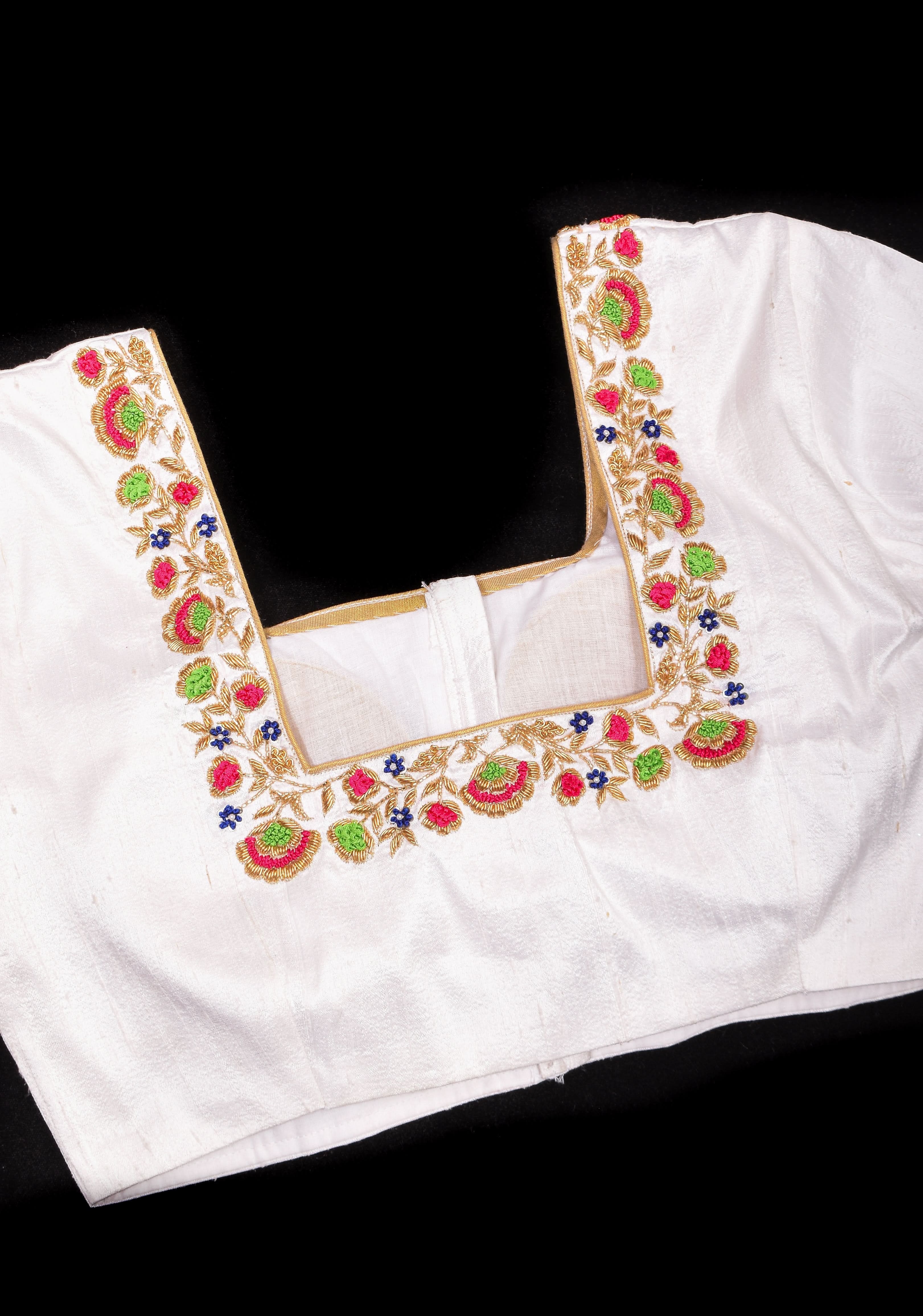 Off White Pure Raw Silk Blouse with multicolor Resham Hand Embroidery | Shobitam