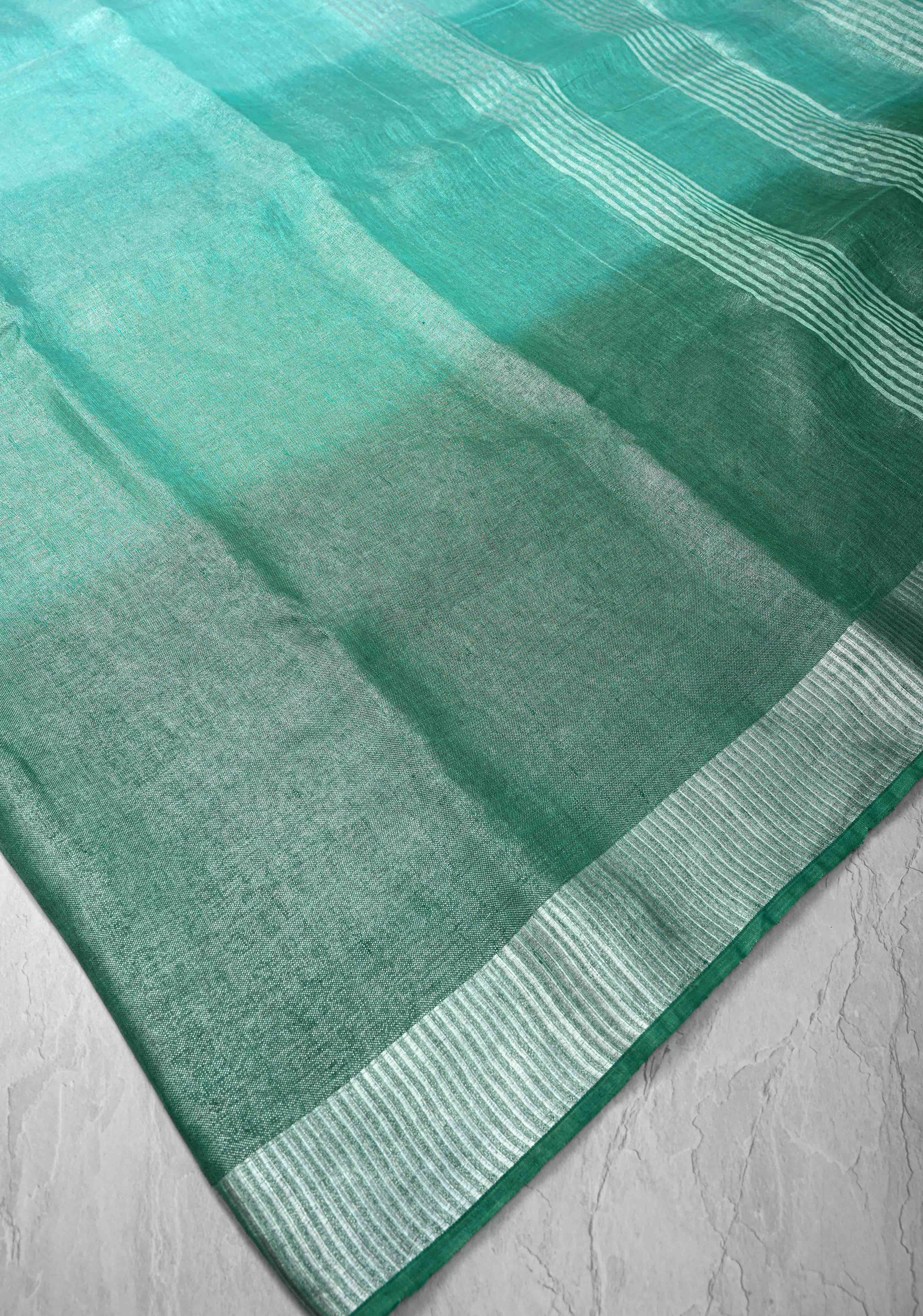 Cyan and Sea Green Ombre Shaded Tissue Linen Saree with Zari Border | Shobitam