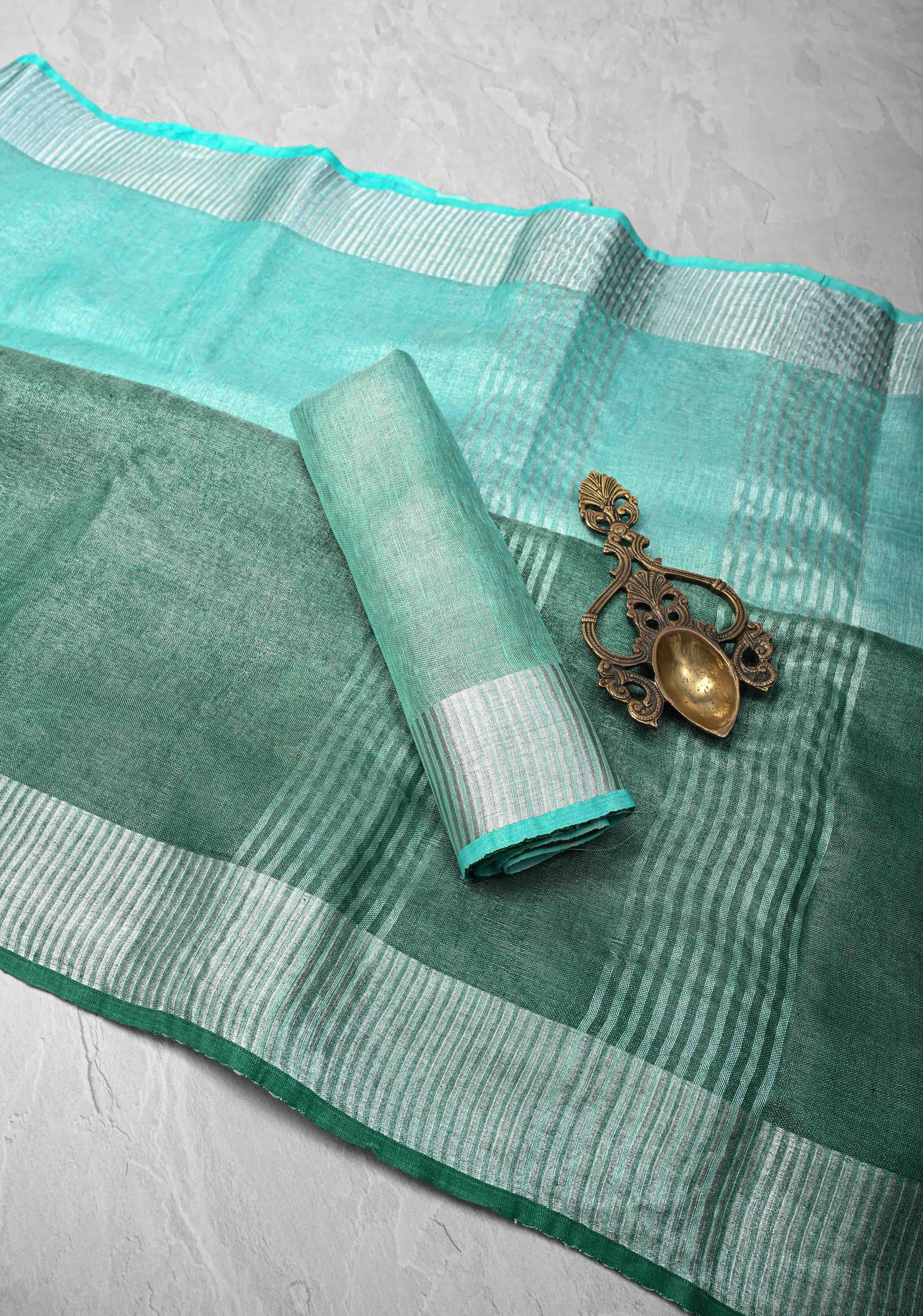 Cyan and Sea Green Ombre Shaded Tissue Linen Saree with Zari Border | Shobitam