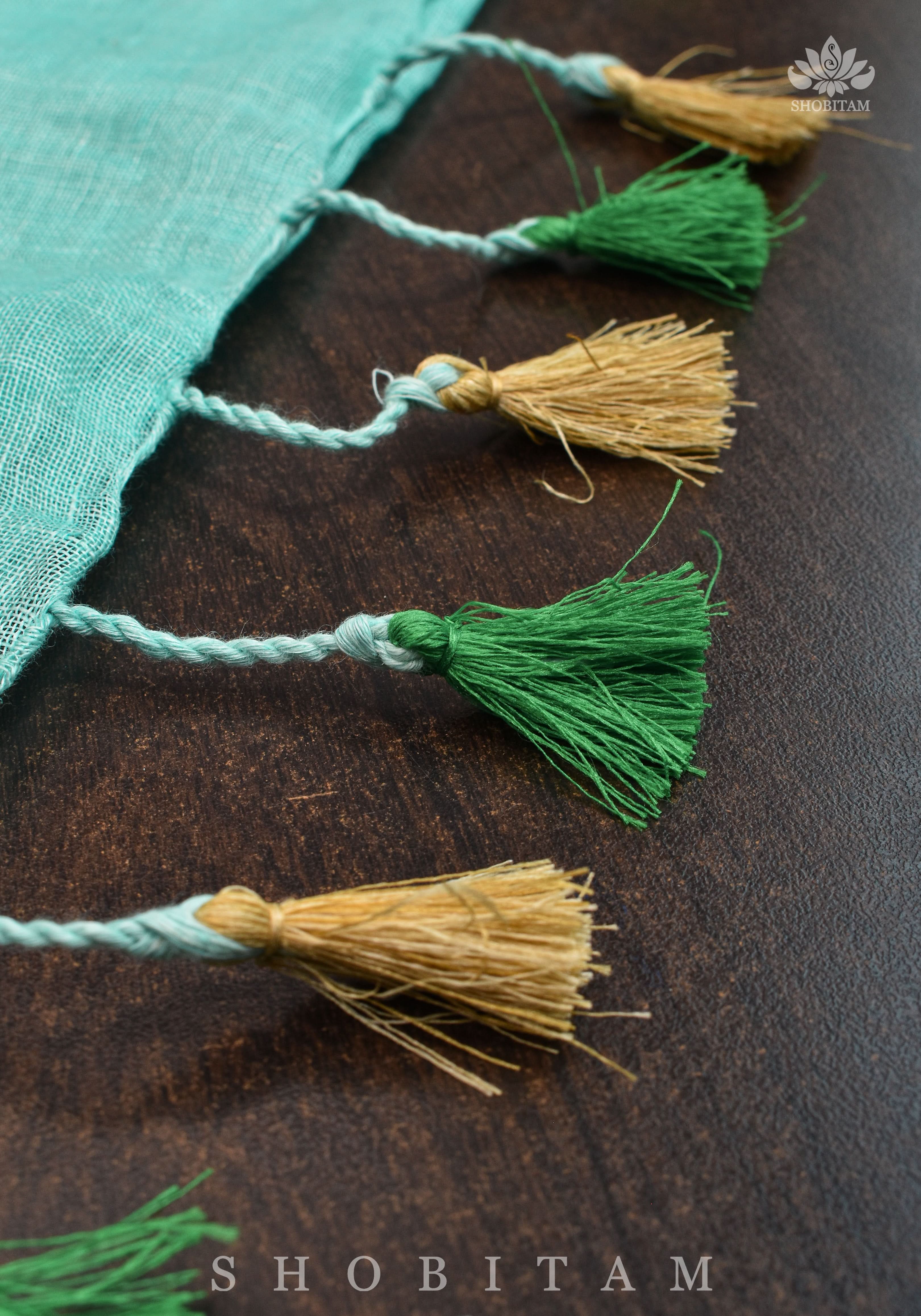 Jaali Pallu - Cutwork and Mirrorwork Saree in Linen by Linen in Teal Color | Shobitam