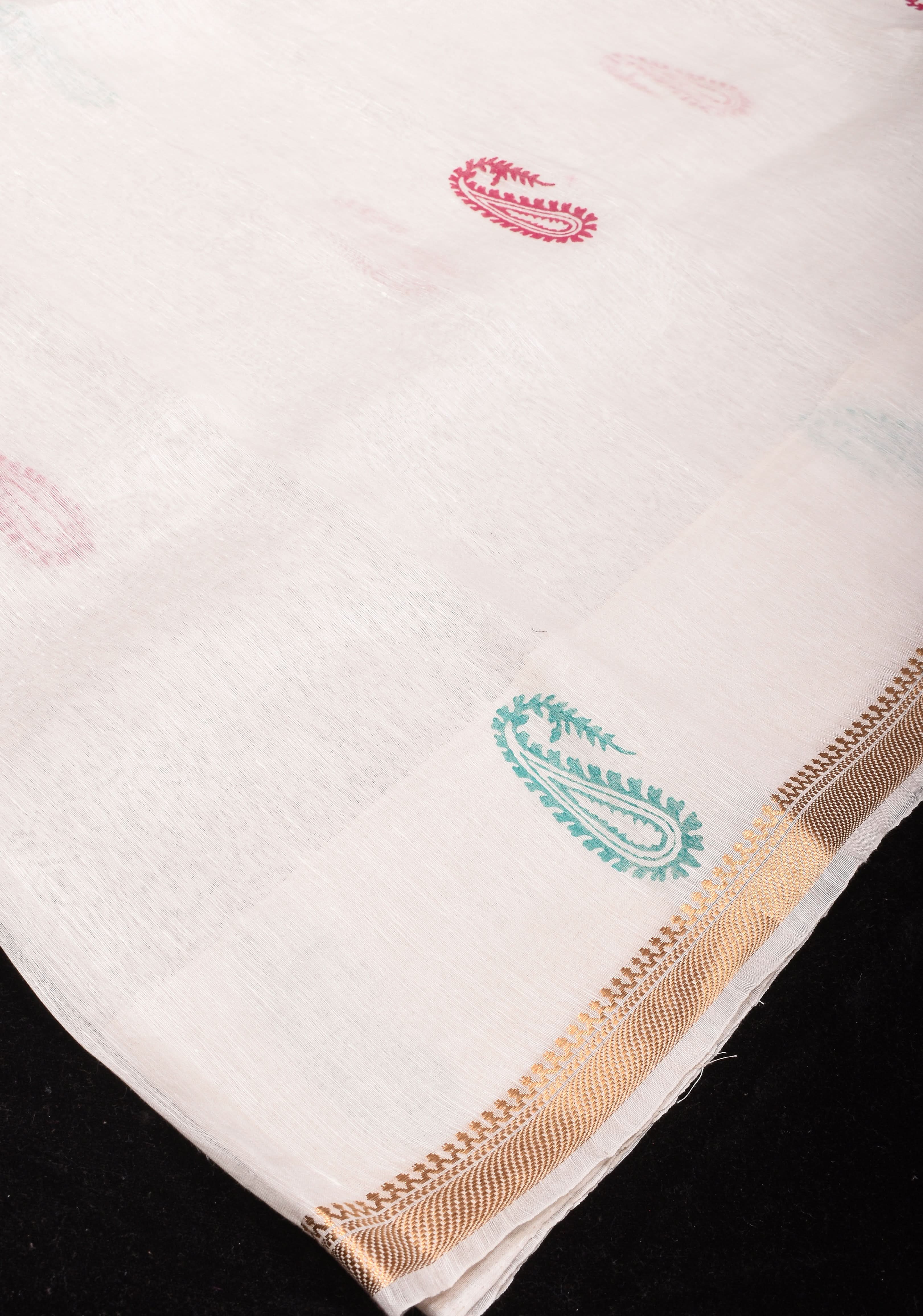 White Silk Linen Saree with Sanganeri Block Print  Paisley buttas and Woven Zari Borders | Shobitam