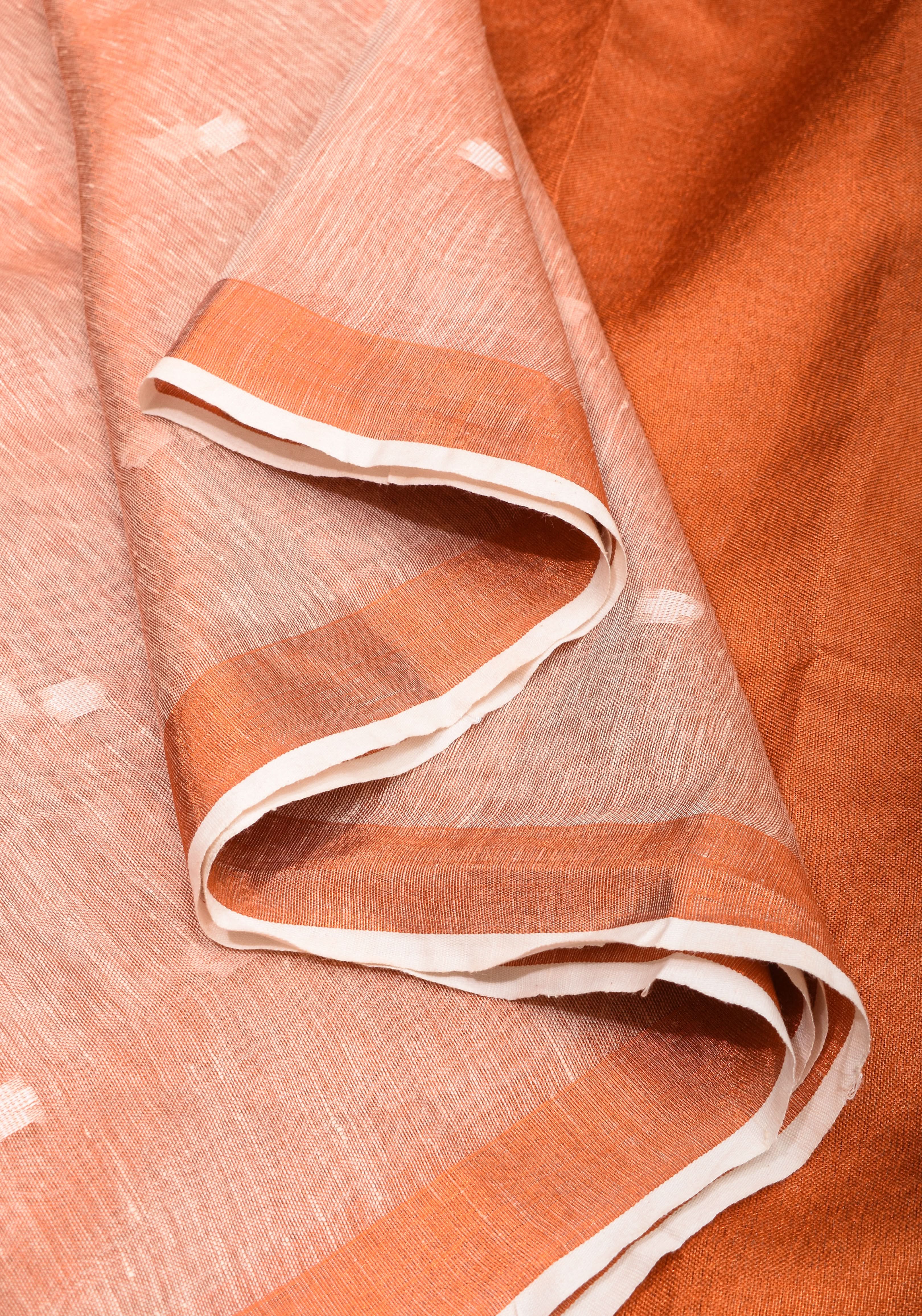 Peach Copper Tissue Linen Saree with Chunri Buttas and Tissue Pallu | Shobitam