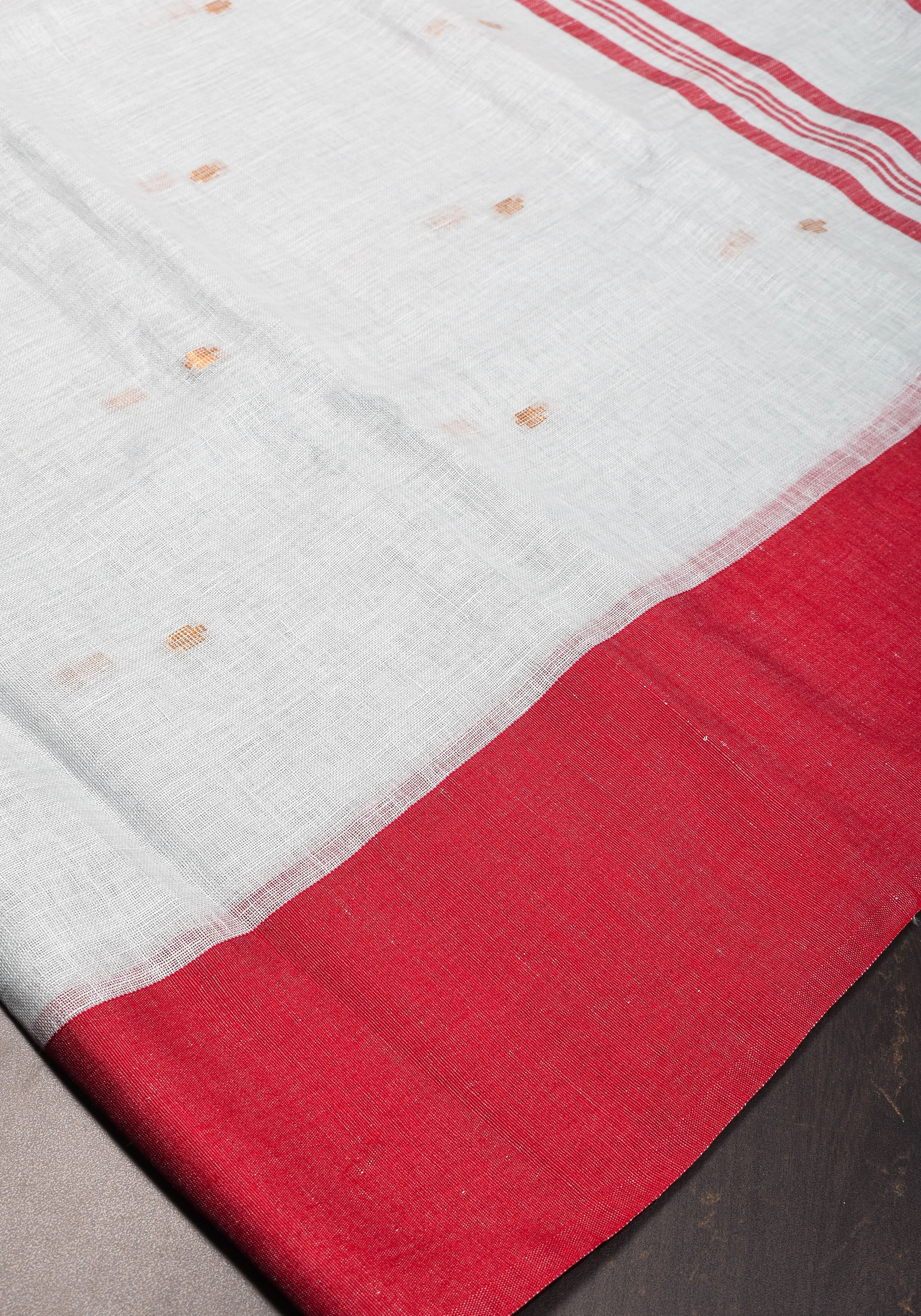 Off White and Red Linen by Linen Saree with thread Buttas | Shobitam